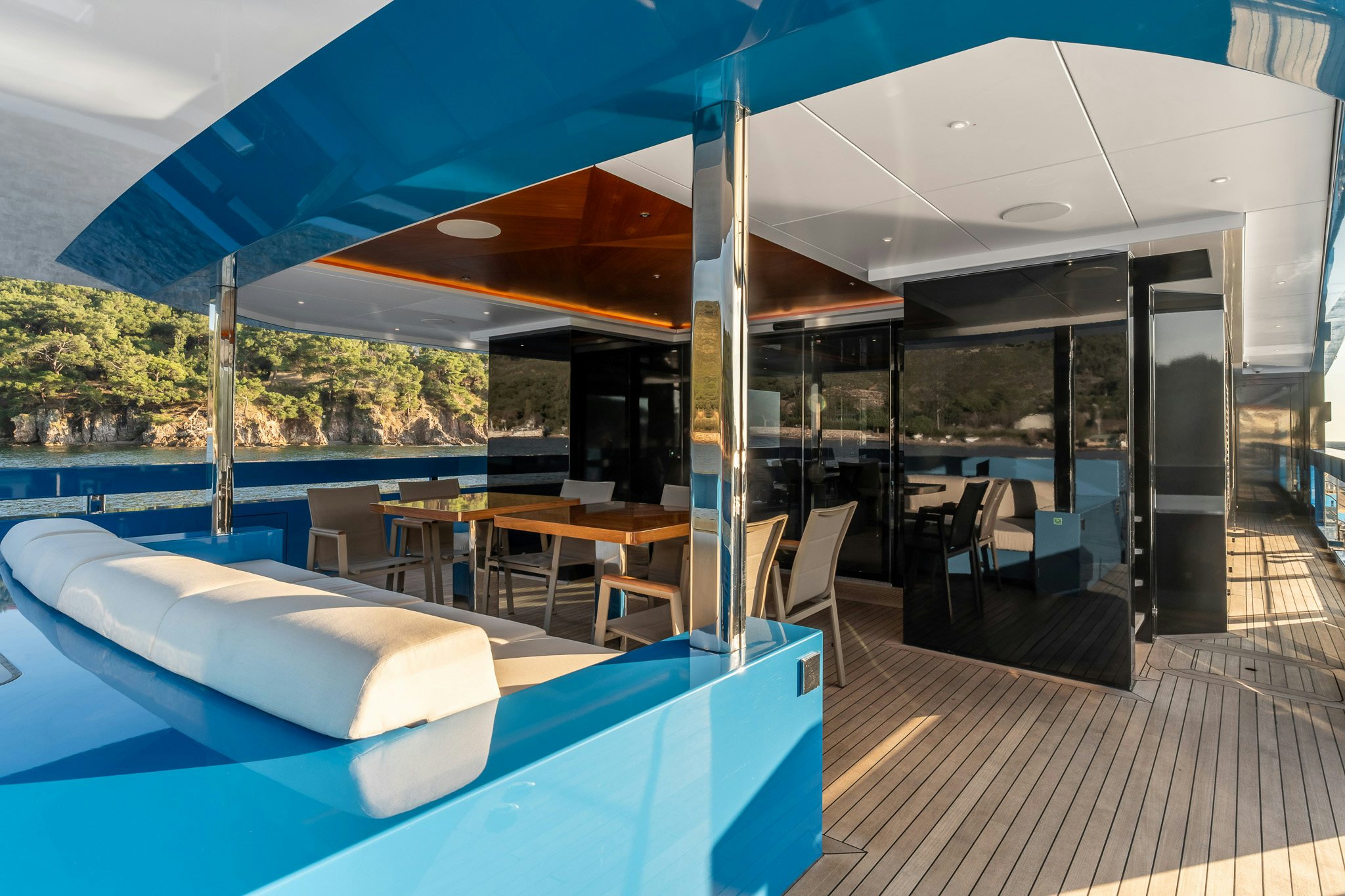 a pool with a deck and chairs aboard MERELEY I Yacht for Sale