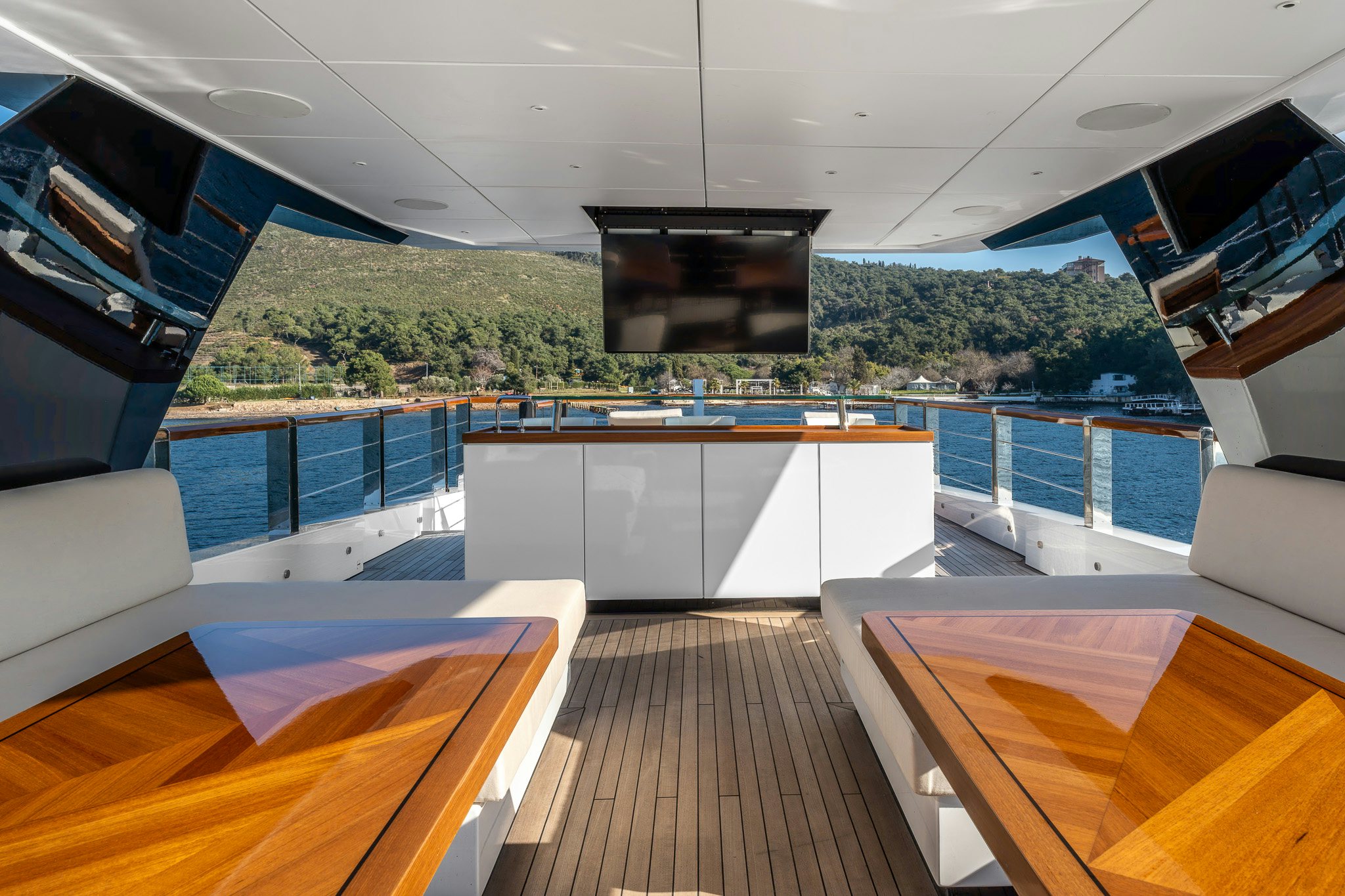 a large open kitchen with a large black grill aboard MERELEY I Yacht for Sale