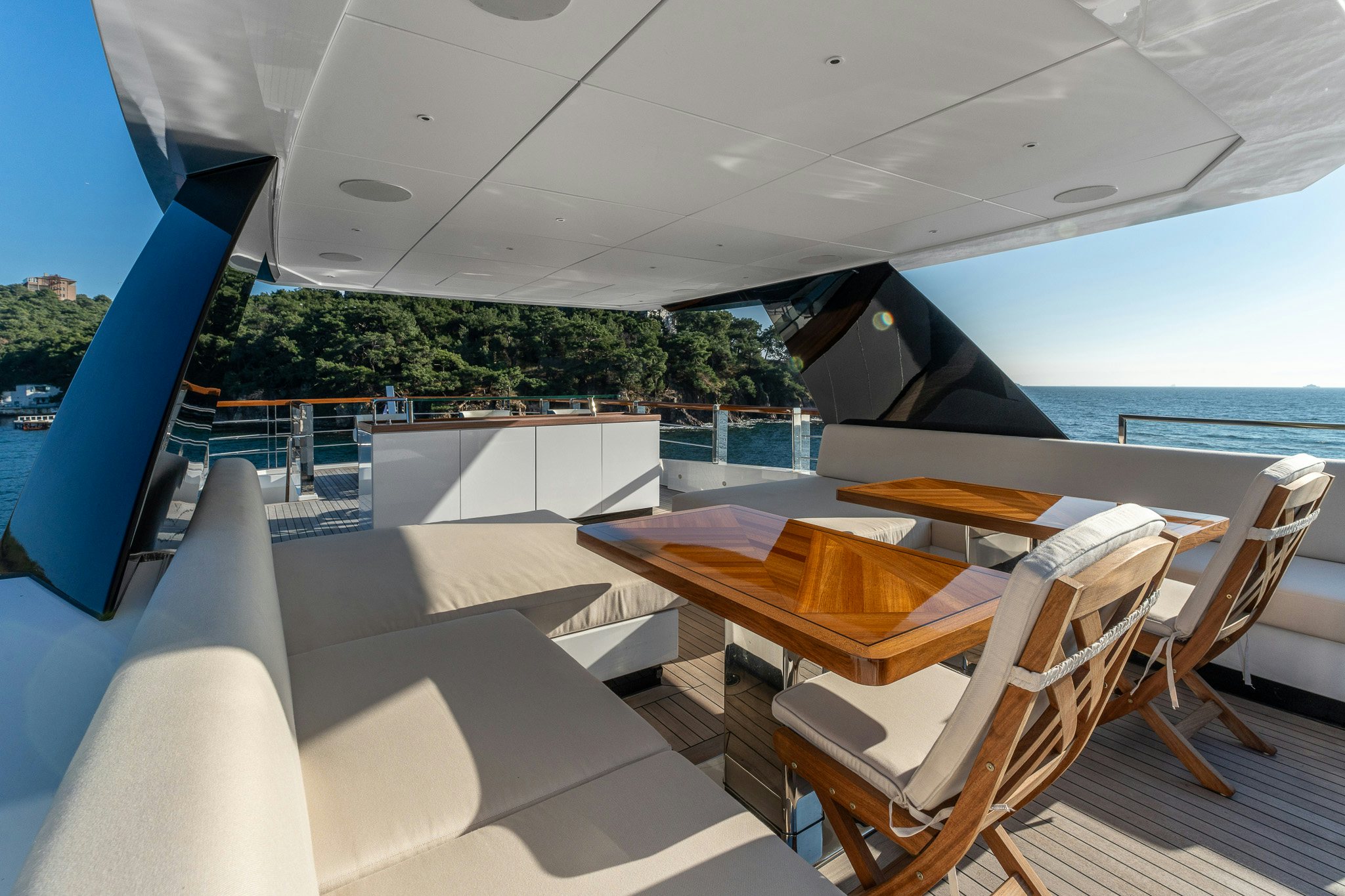 a room with a table and chairs aboard MERELEY I Yacht for Sale