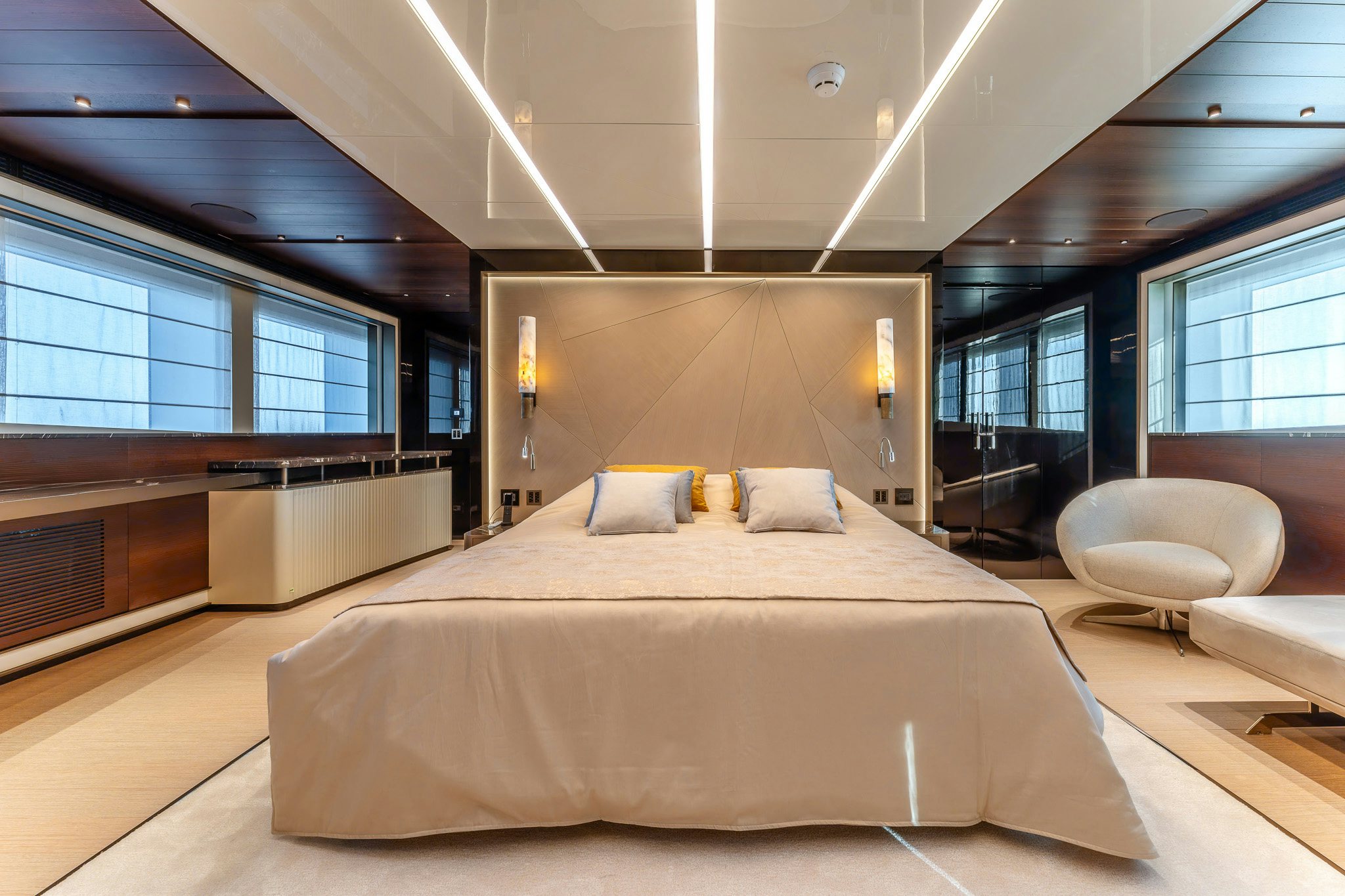 a large bedroom with a large bed aboard MERELEY I Yacht for Sale