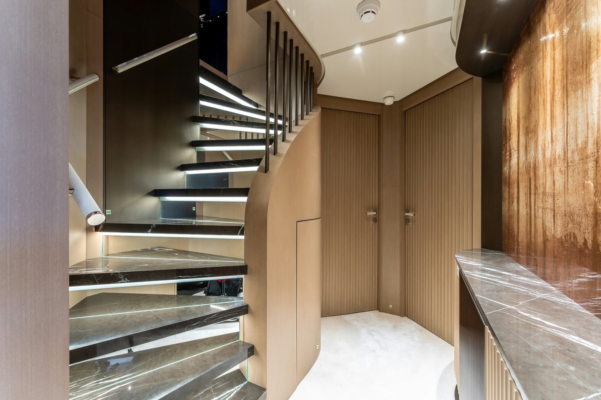 a room with a bed and a staircase aboard MERELEY I Yacht for Sale