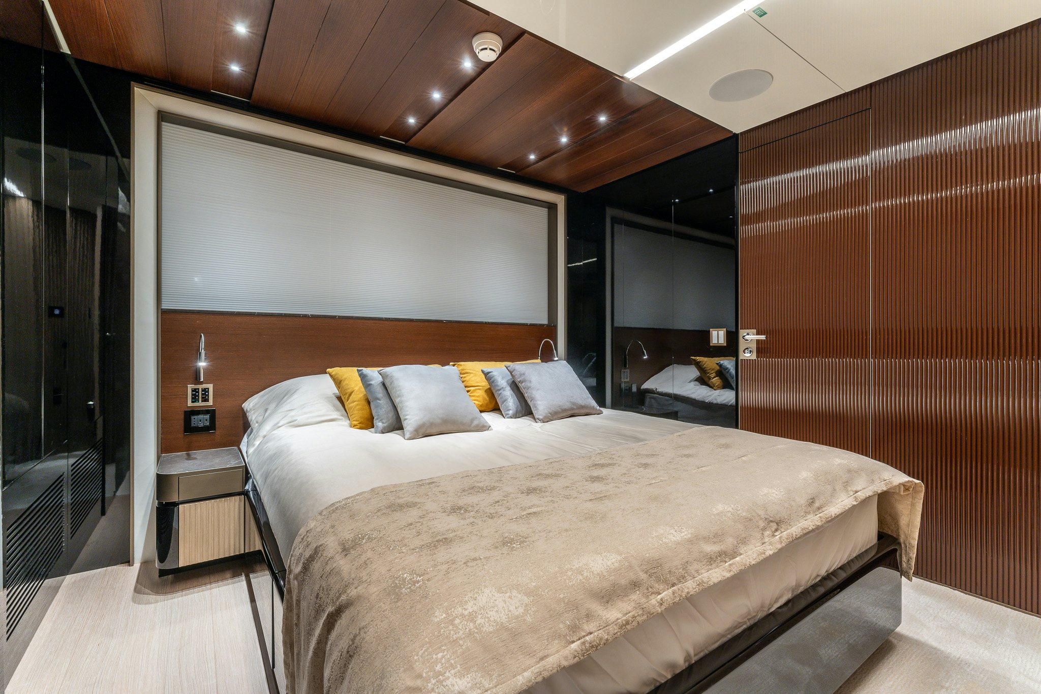 a large bed in a room aboard MERELEY I Yacht for Sale