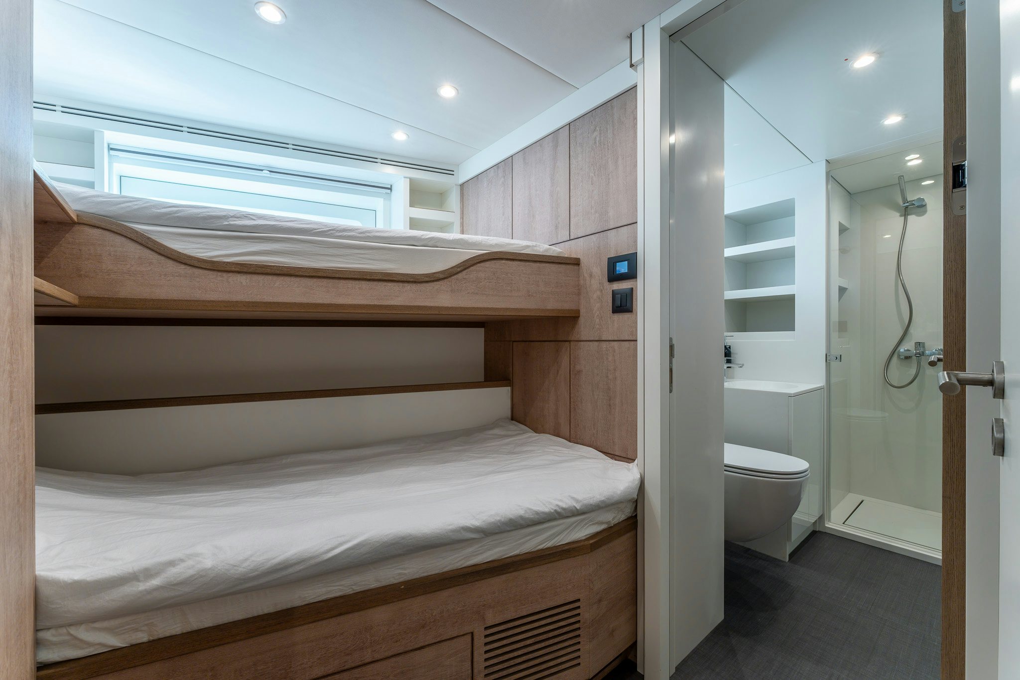 a room with a bed and a closet aboard MERELEY I Yacht for Sale