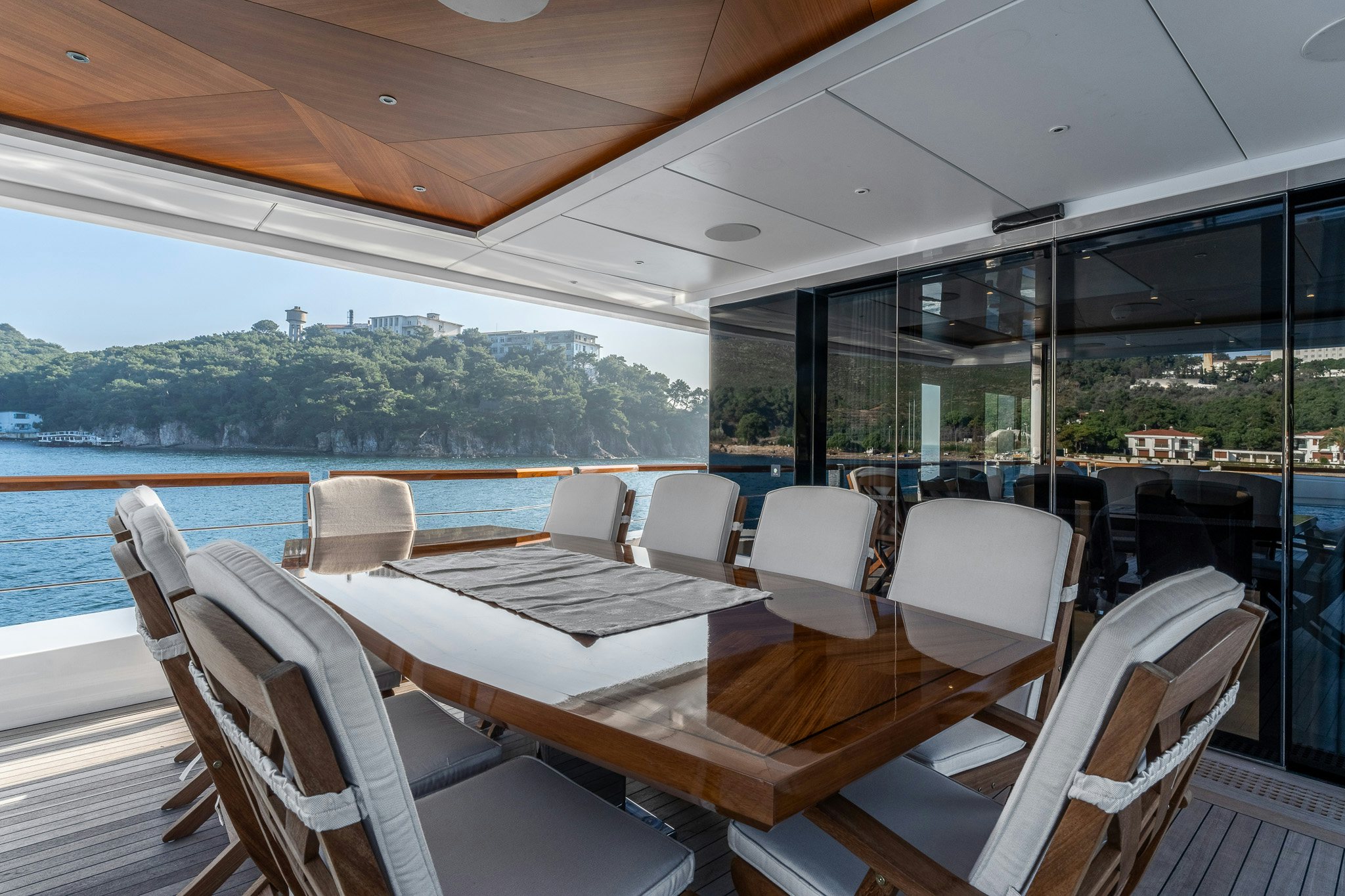 a boat with a table and chairs aboard MERELEY I Yacht for Sale