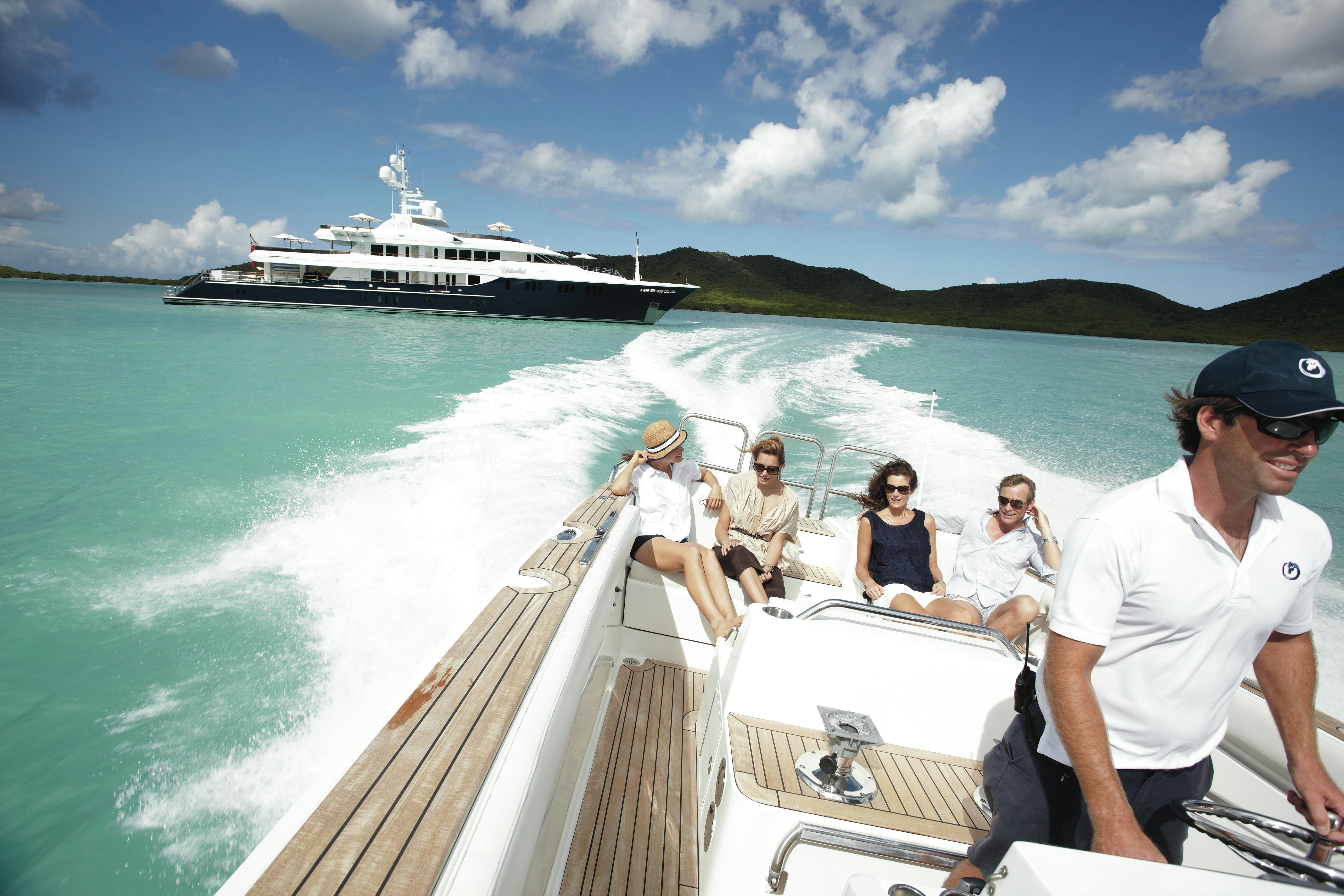 a group of people on a boat aboard UNBRIDLED Yacht for Charter