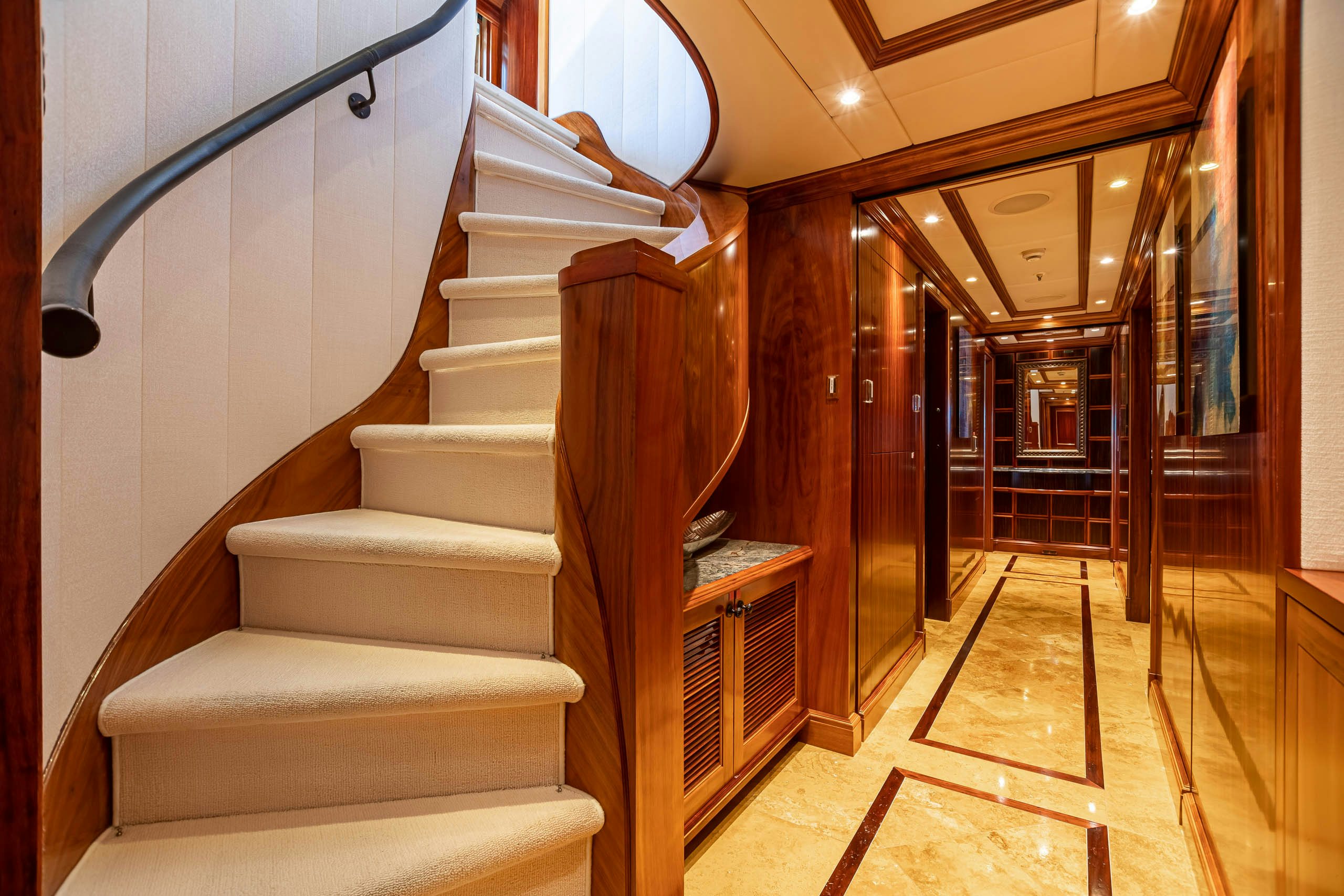 a staircase in a building aboard UNBRIDLED Yacht for Charter