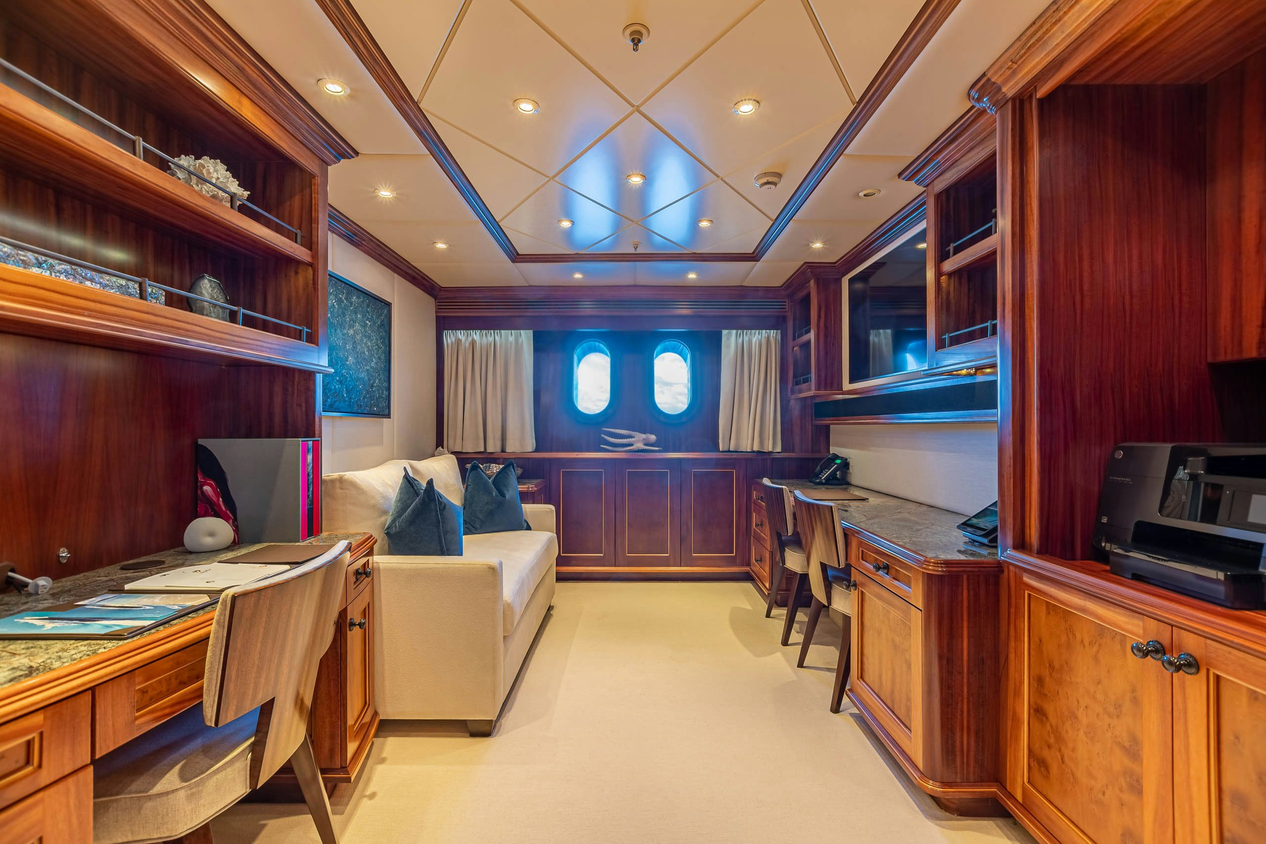 a room with a table and chairs aboard UNBRIDLED Yacht for Charter