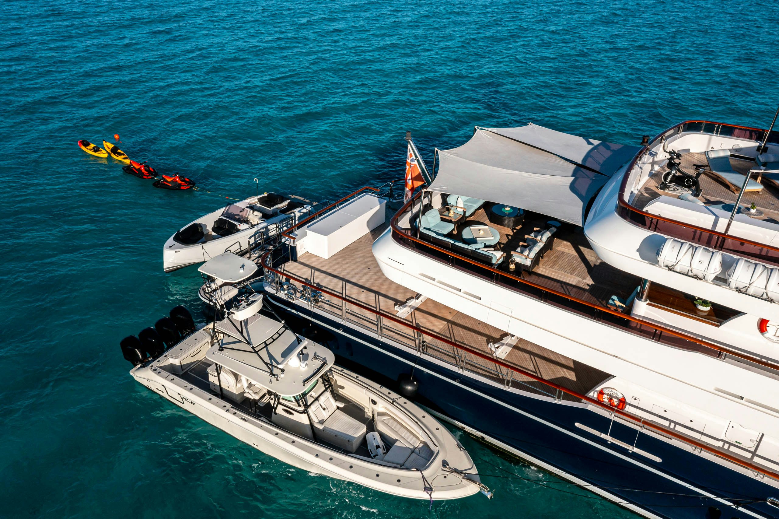 a boat with a boat on it aboard UNBRIDLED Yacht for Charter