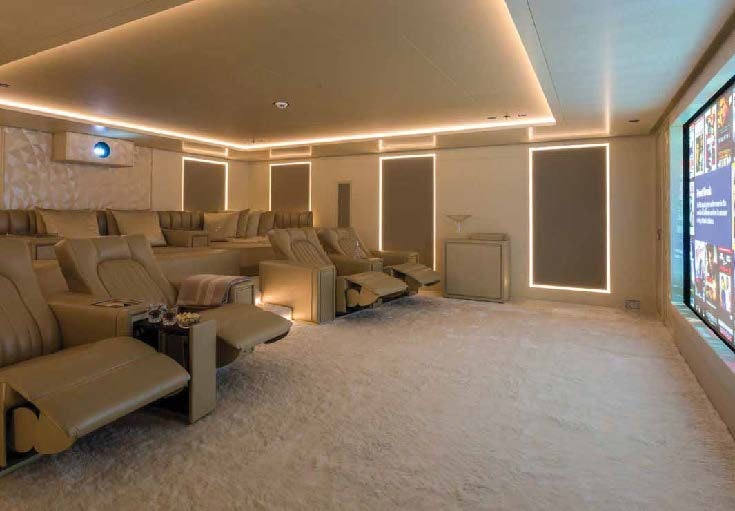 a living room with a couch and a tv aboard LADY LARA Yacht for Sale