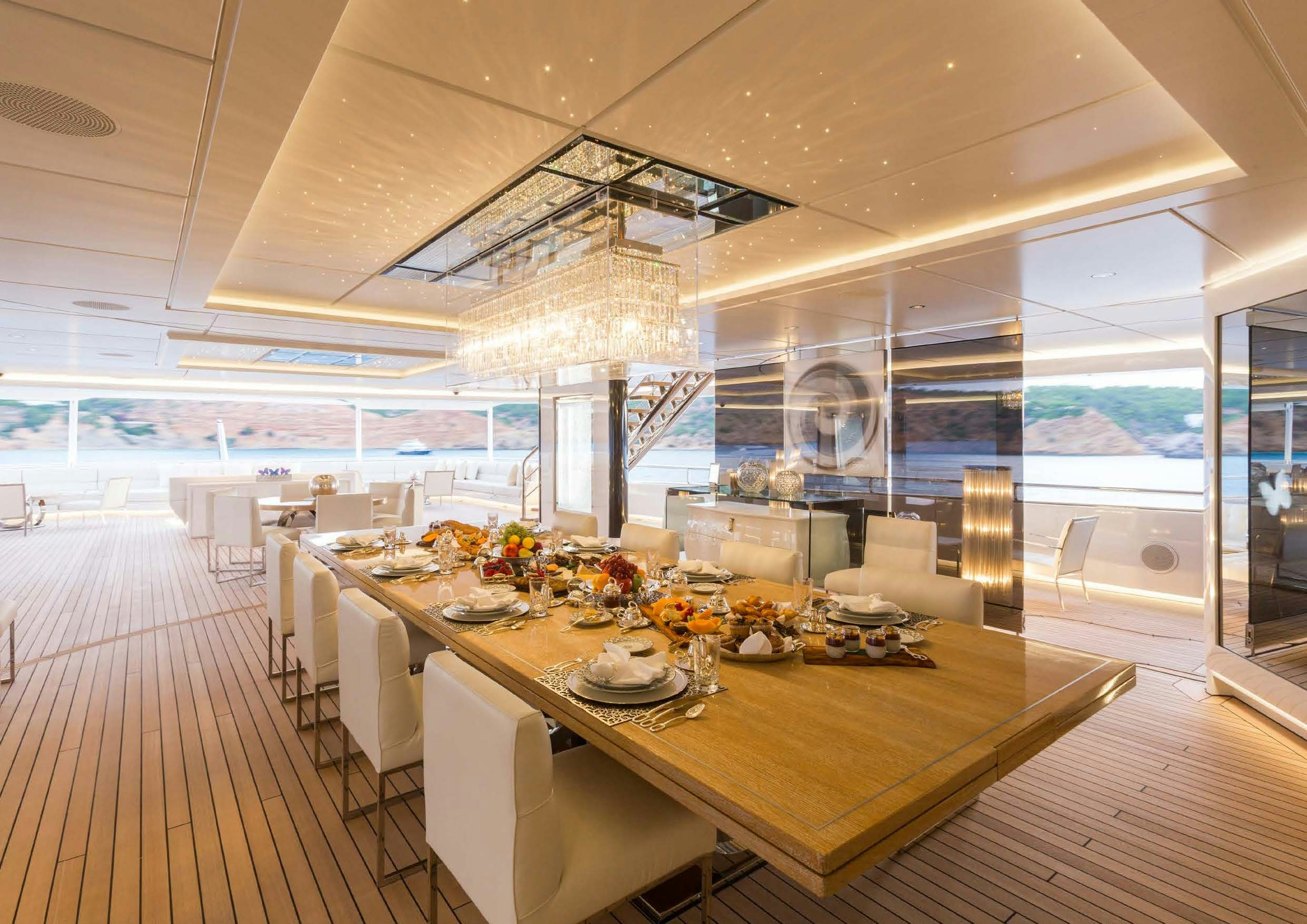 a large dining room with a table aboard LADY LARA Yacht for Sale