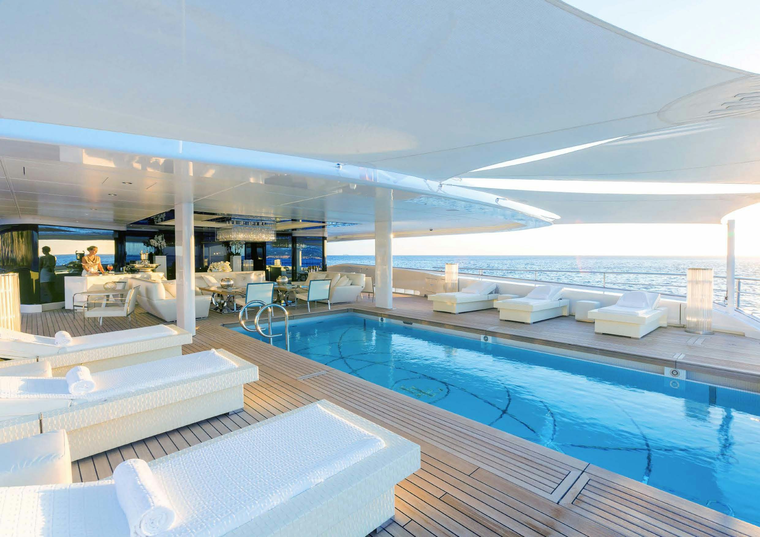 a large room with a pool aboard LADY LARA Yacht for Sale