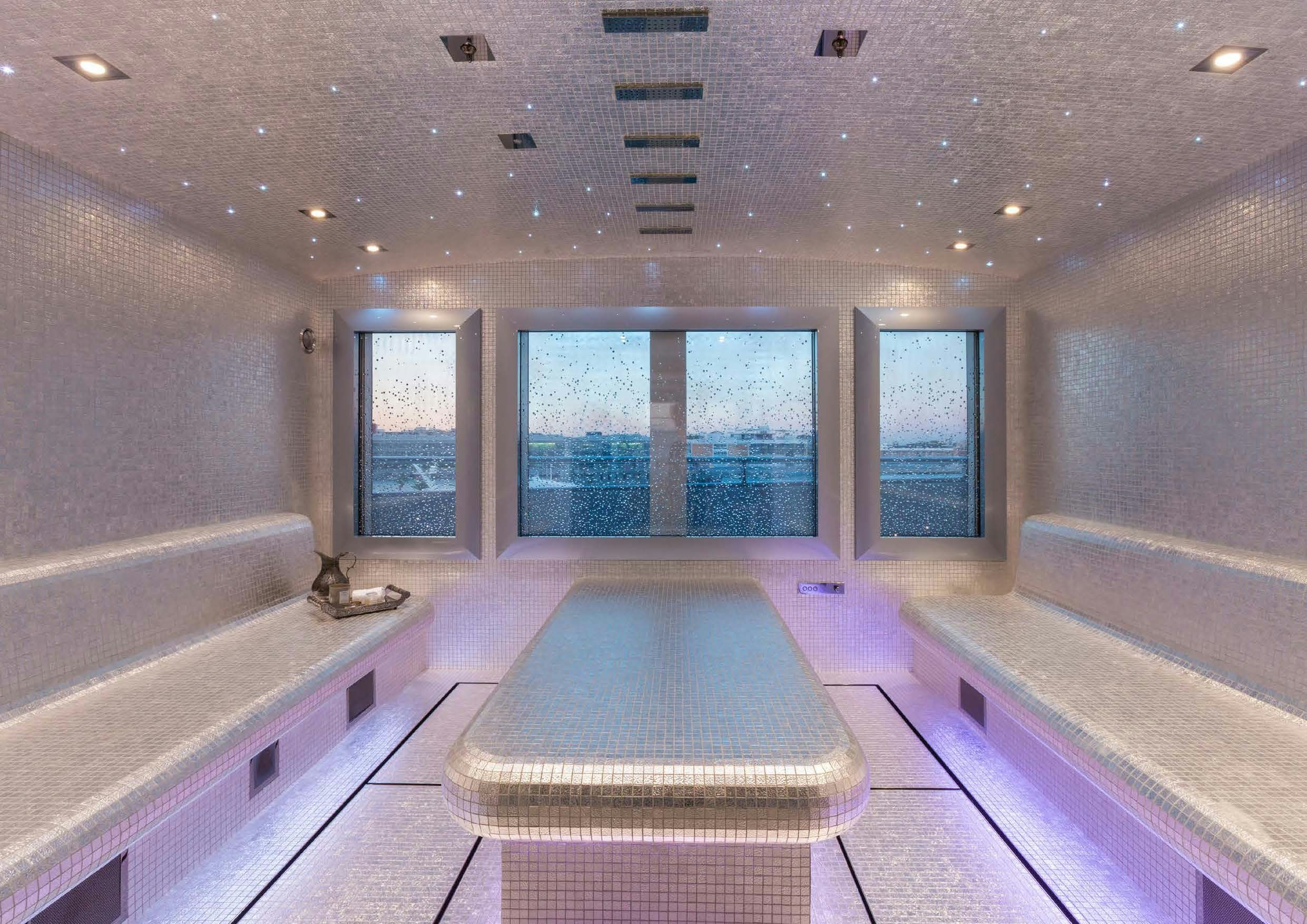 a large indoor swimming pool aboard LADY LARA Yacht for Sale