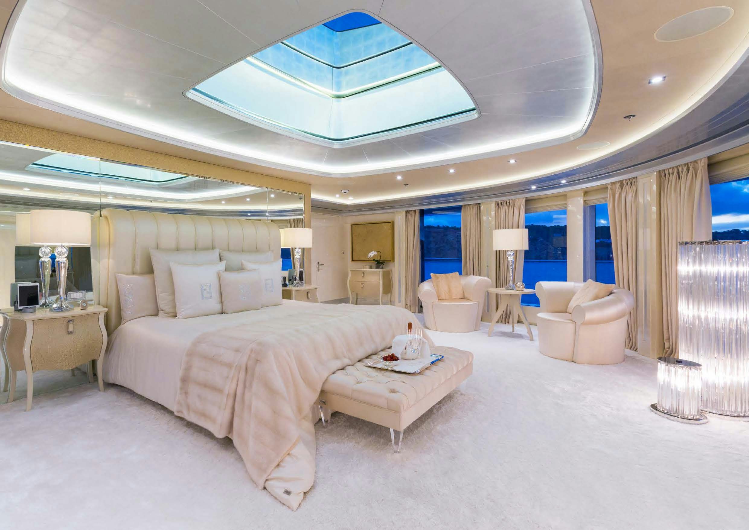 a large bedroom with a large bed aboard LADY LARA Yacht for Sale