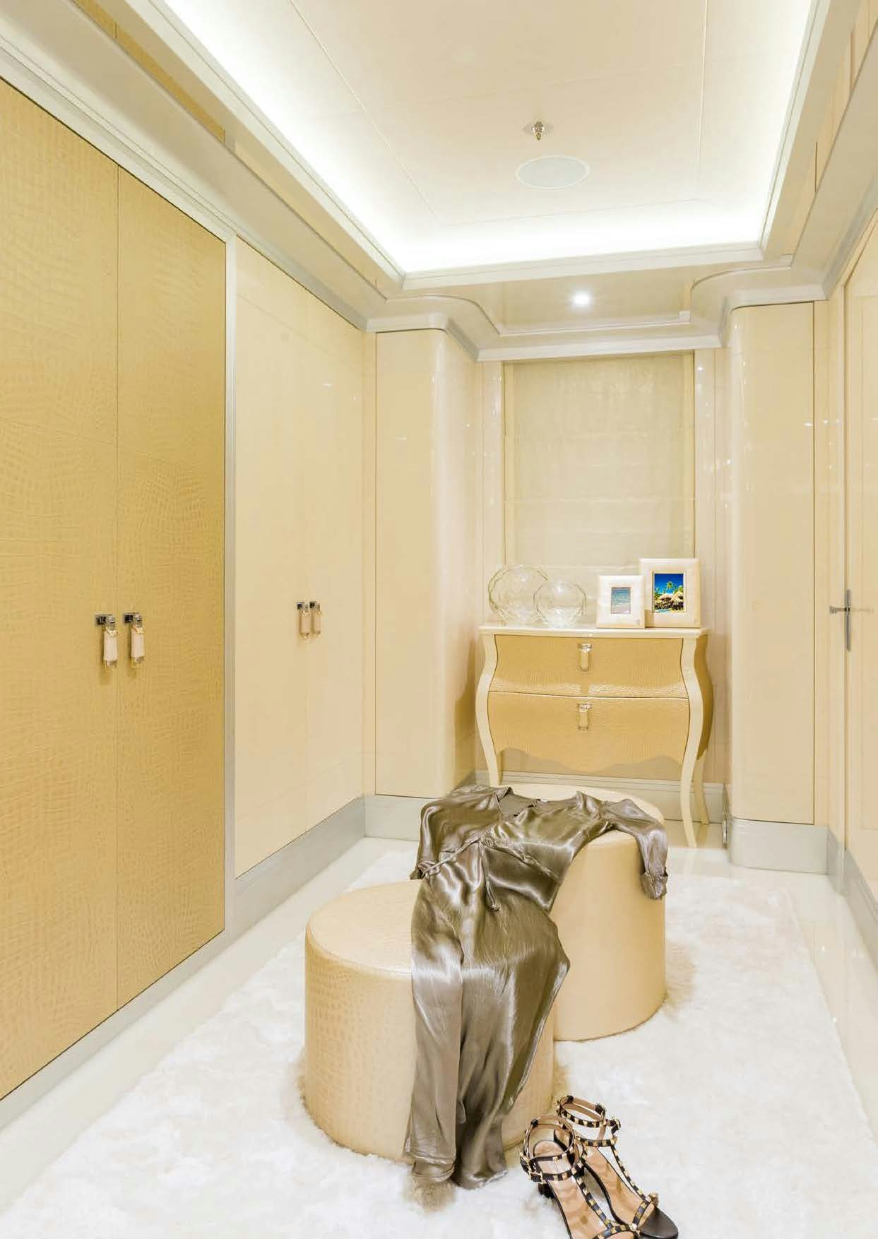 a room with a table and a chair aboard LADY LARA Yacht for Sale