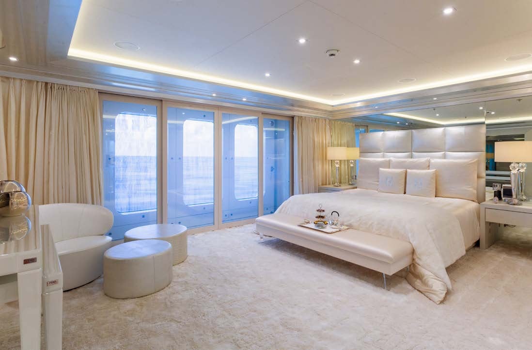a large bedroom with a large bed aboard LADY LARA Yacht for Sale