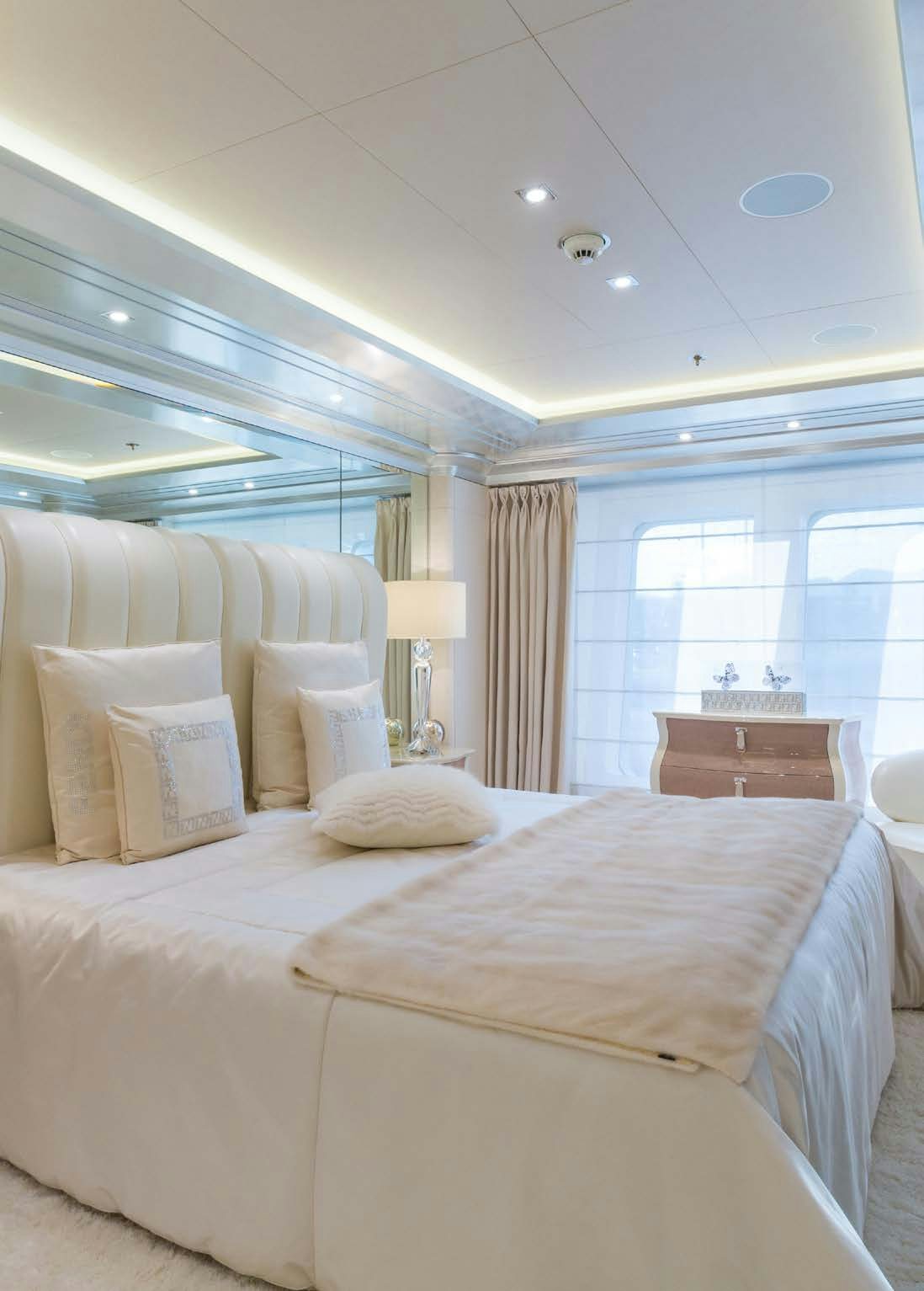 a bed with pillows aboard LADY LARA Yacht for Sale