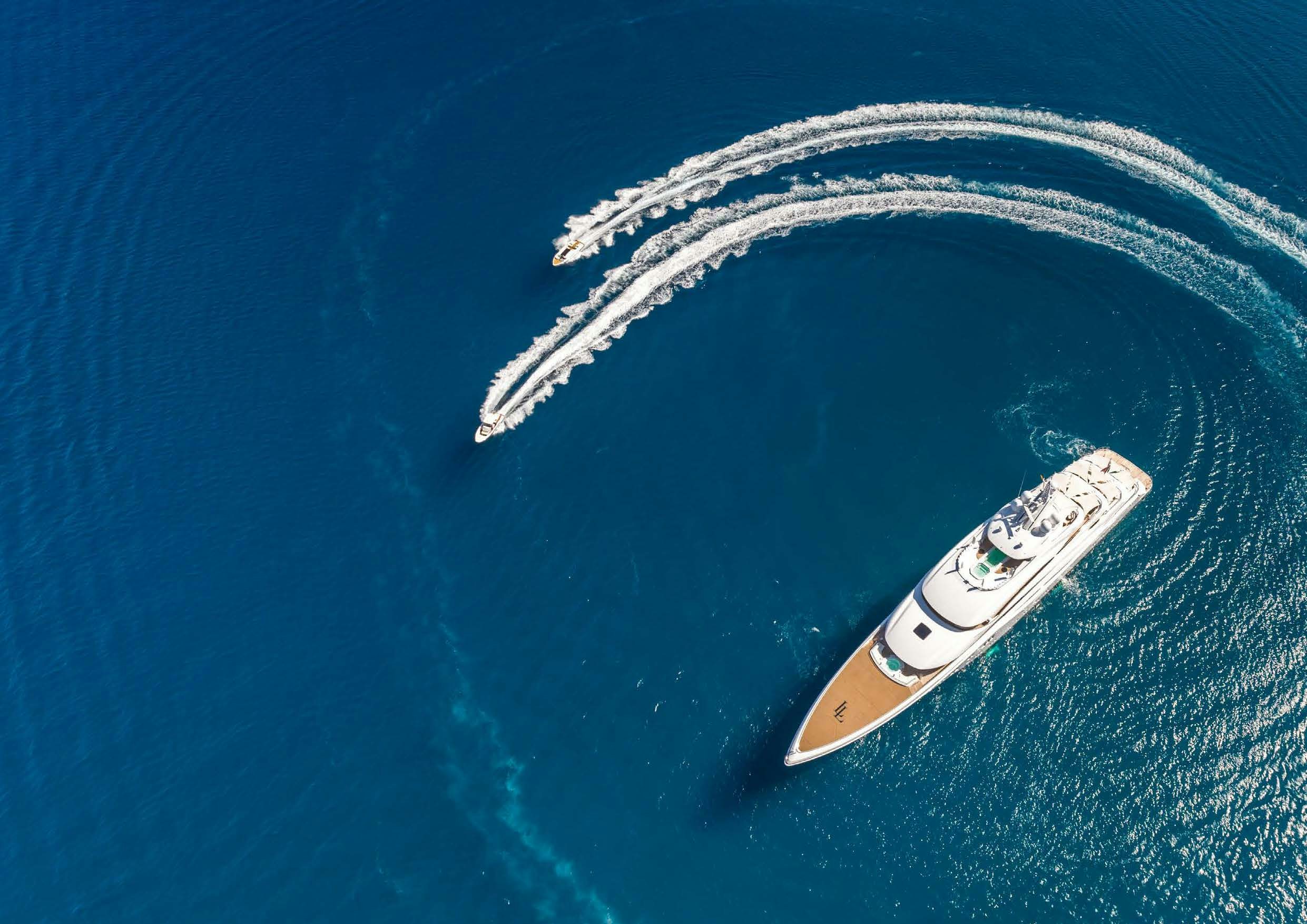 a white and black boat aboard LADY LARA Yacht for Sale