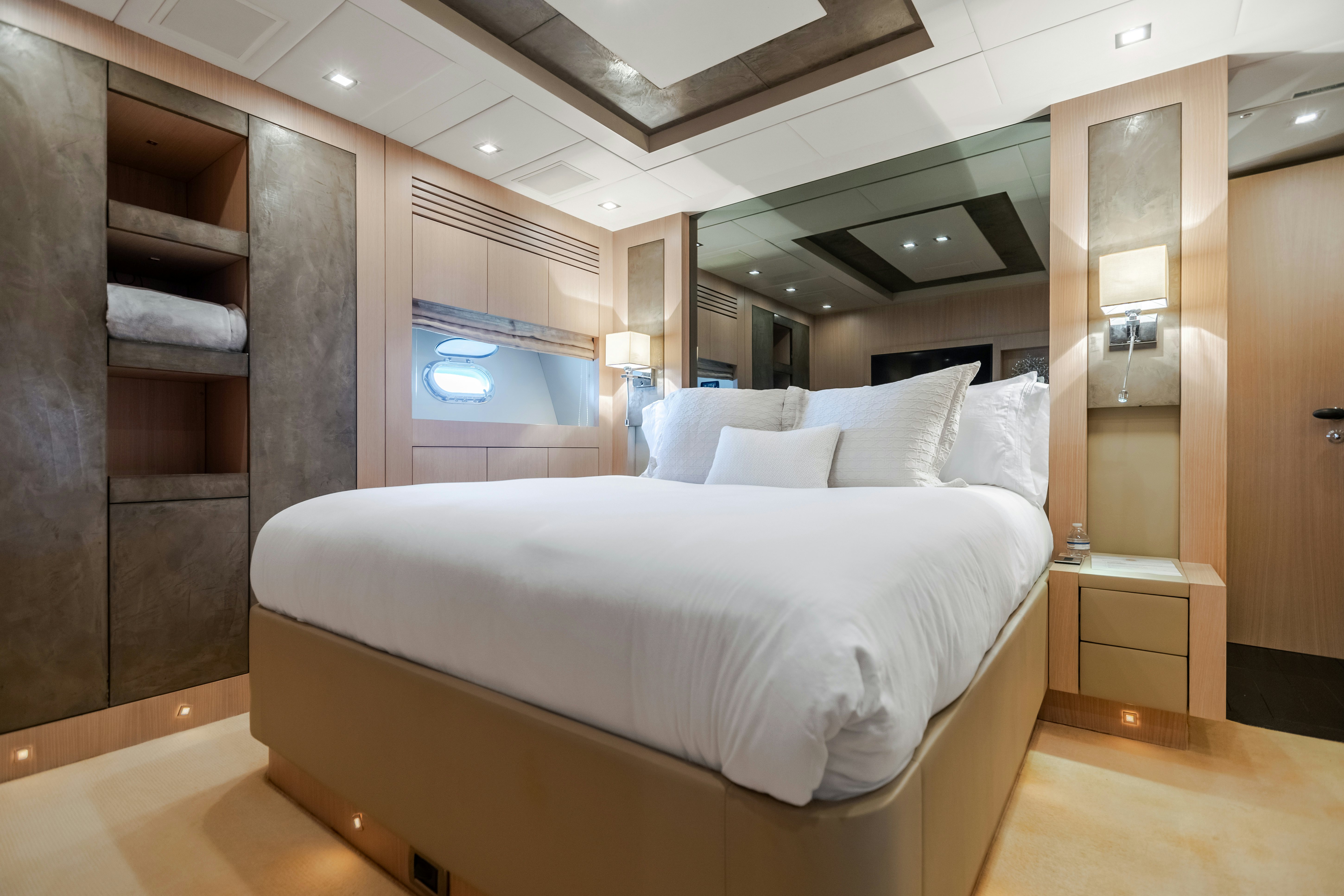 a bed in a room aboard TOTAL Yacht for Sale