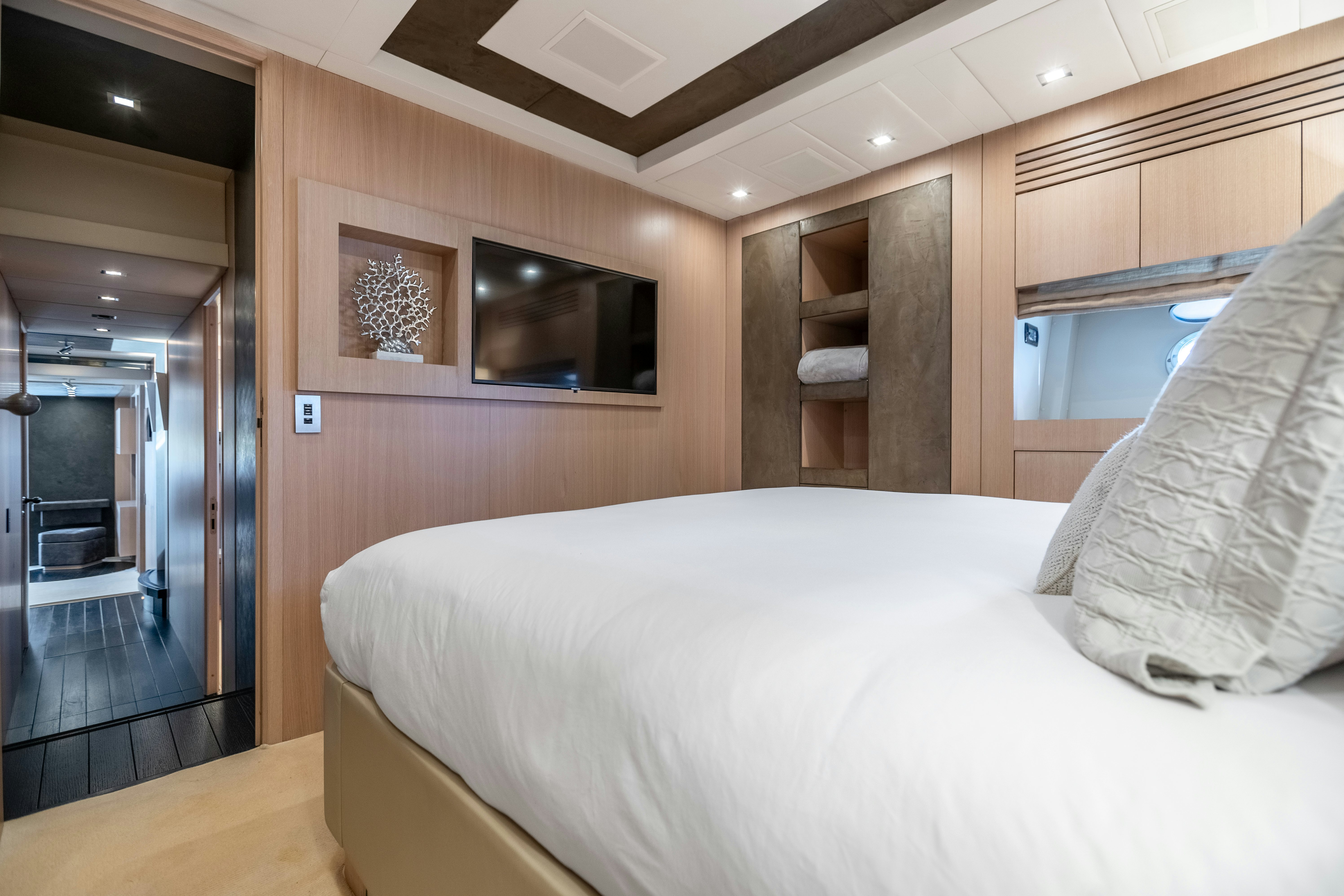 a bedroom with a bed aboard TOTAL Yacht for Sale