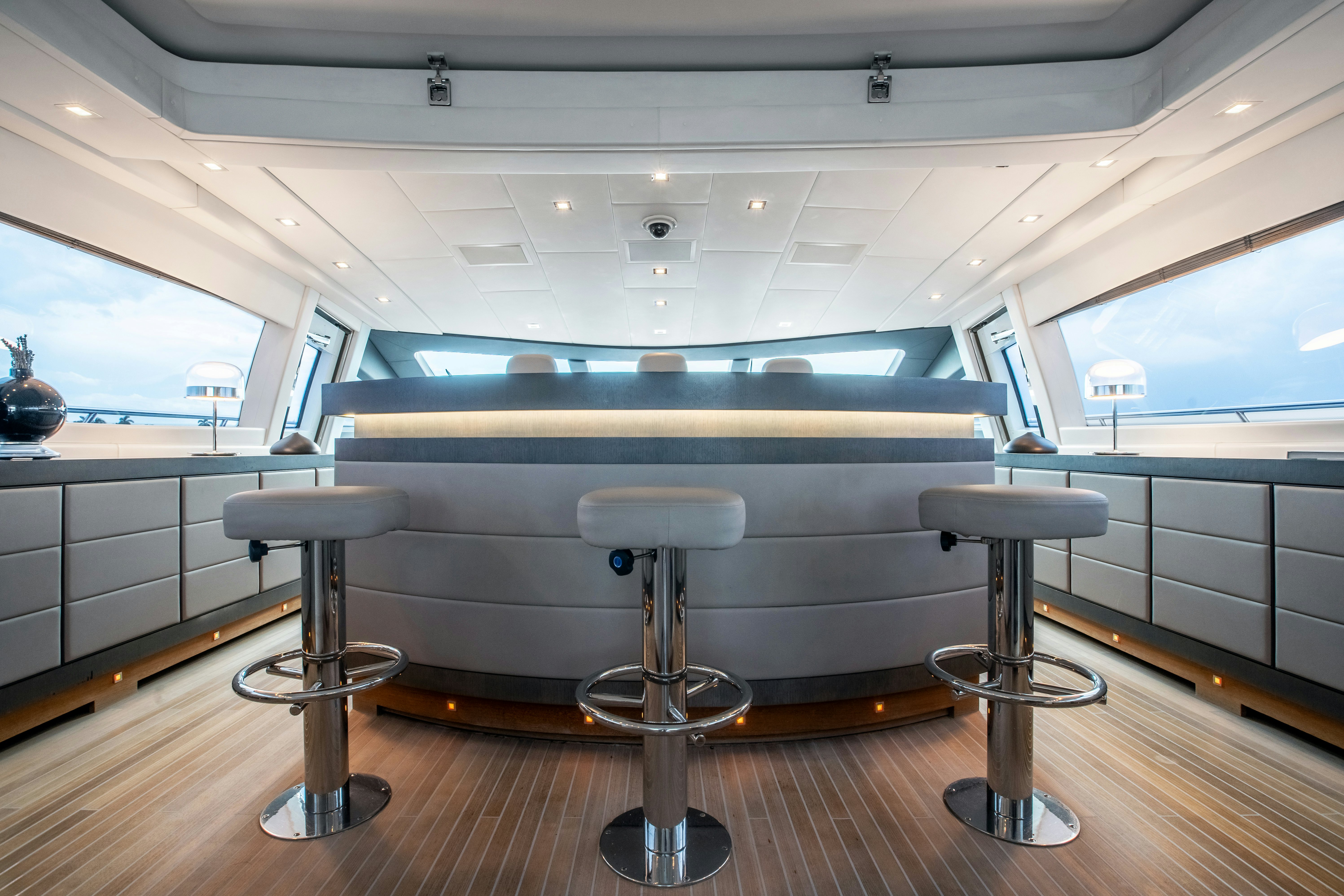 a room with stools and stools aboard TOTAL Yacht for Sale