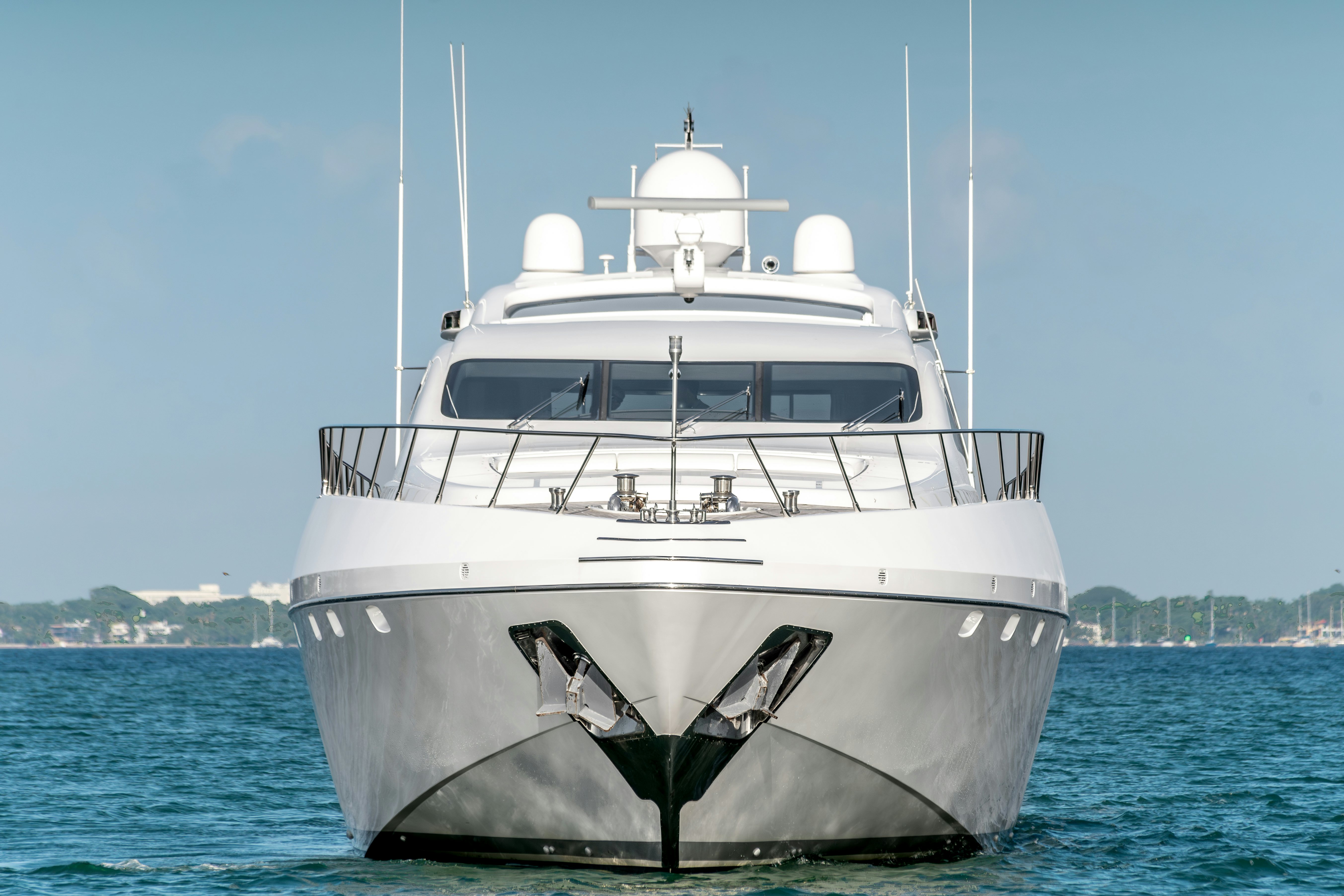 a white boat in the water aboard TOTAL Yacht for Sale