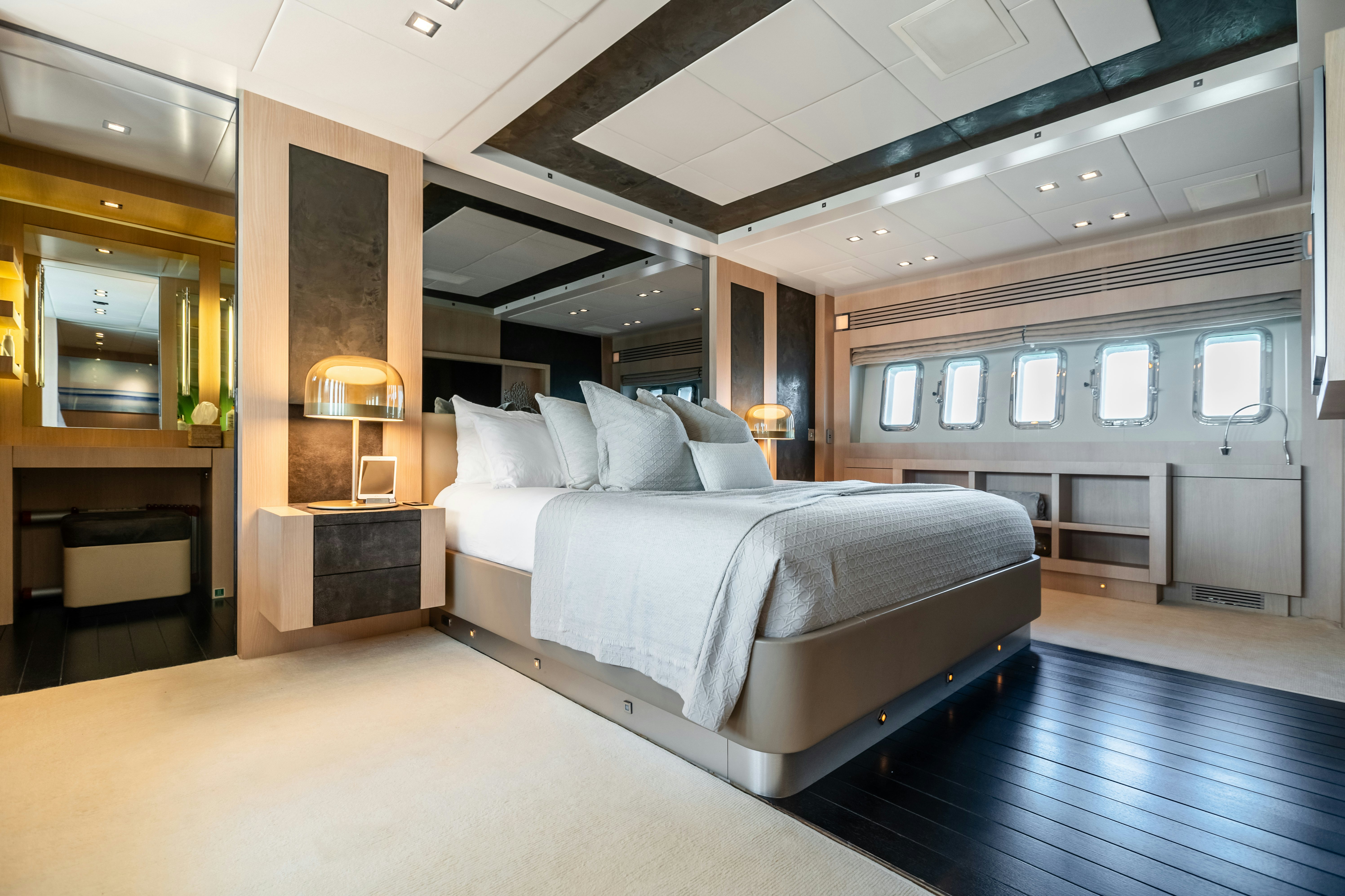 a large bedroom with a large bed aboard TOTAL Yacht for Sale