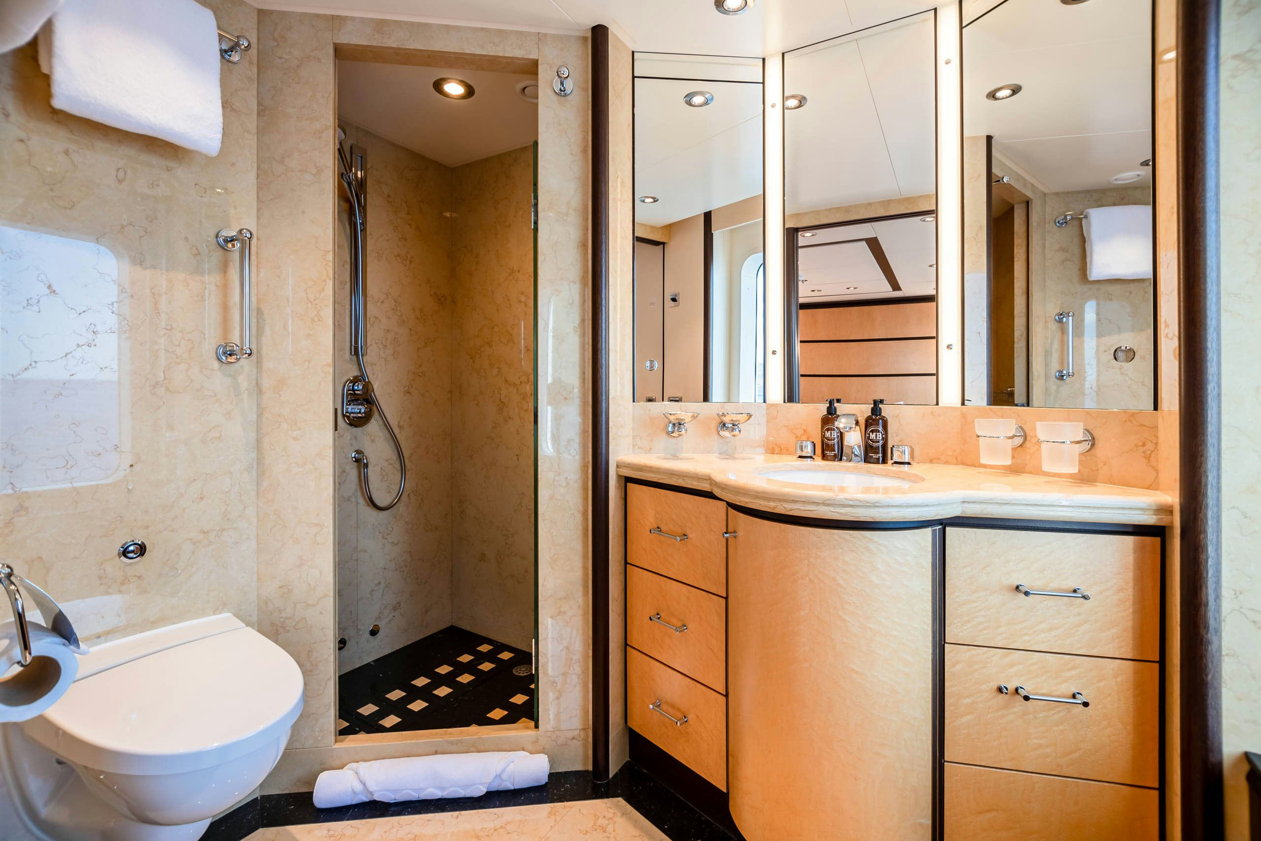 a bathroom with a large shower aboard HARLE Yacht for Charter