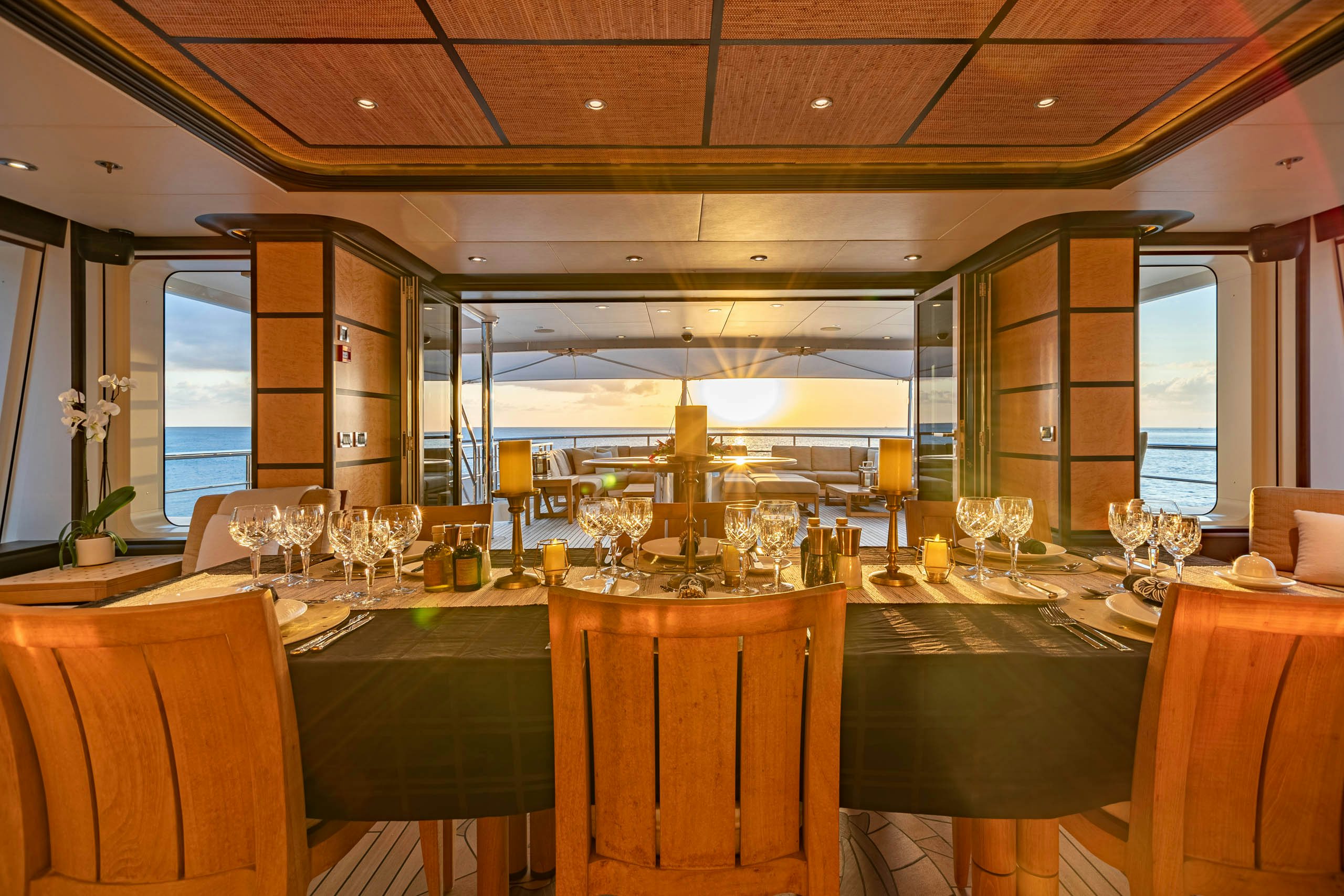 a room with many wine glasses aboard HARLE Yacht for Charter