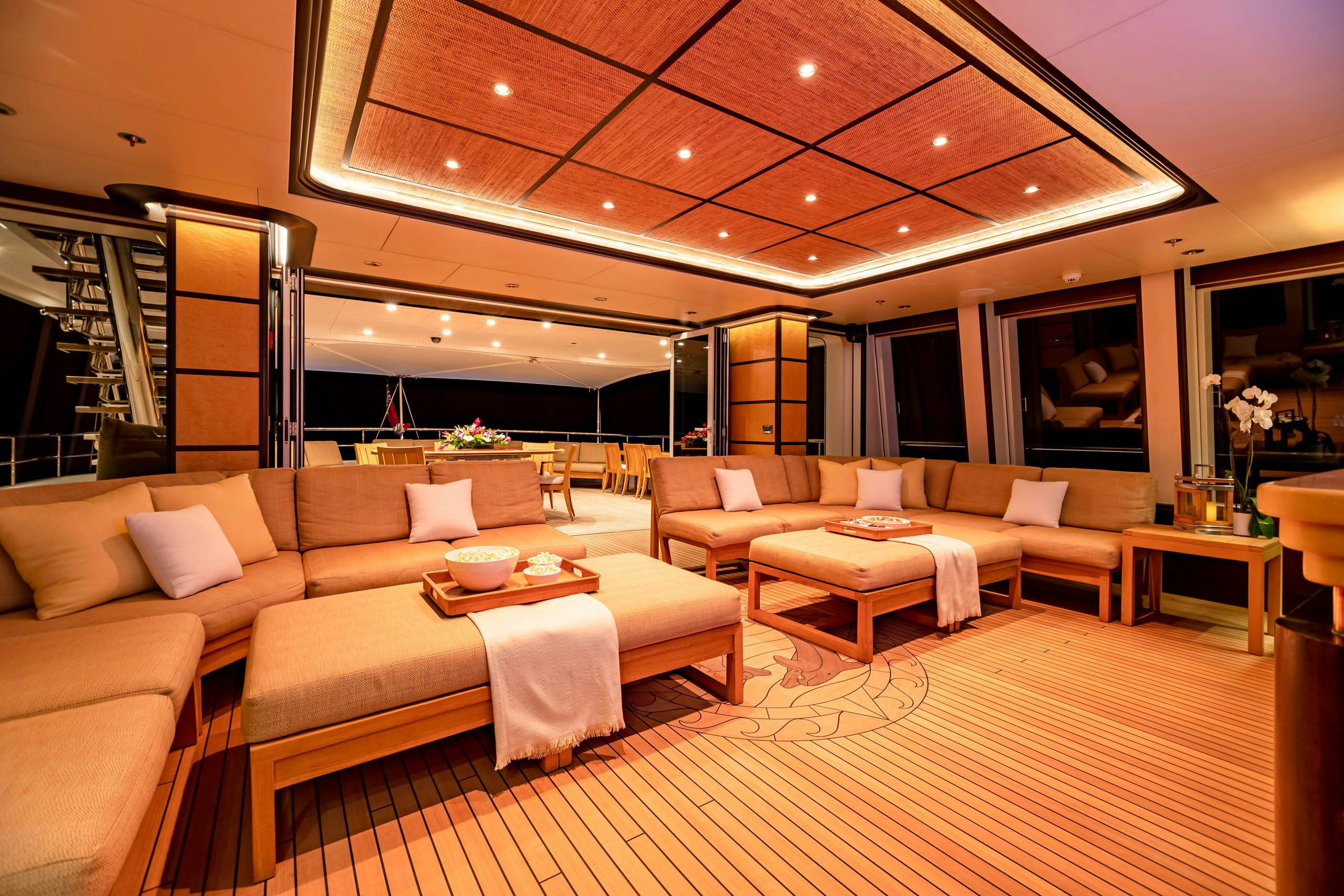 a large living room with a large open roof aboard HARLE Yacht for Charter