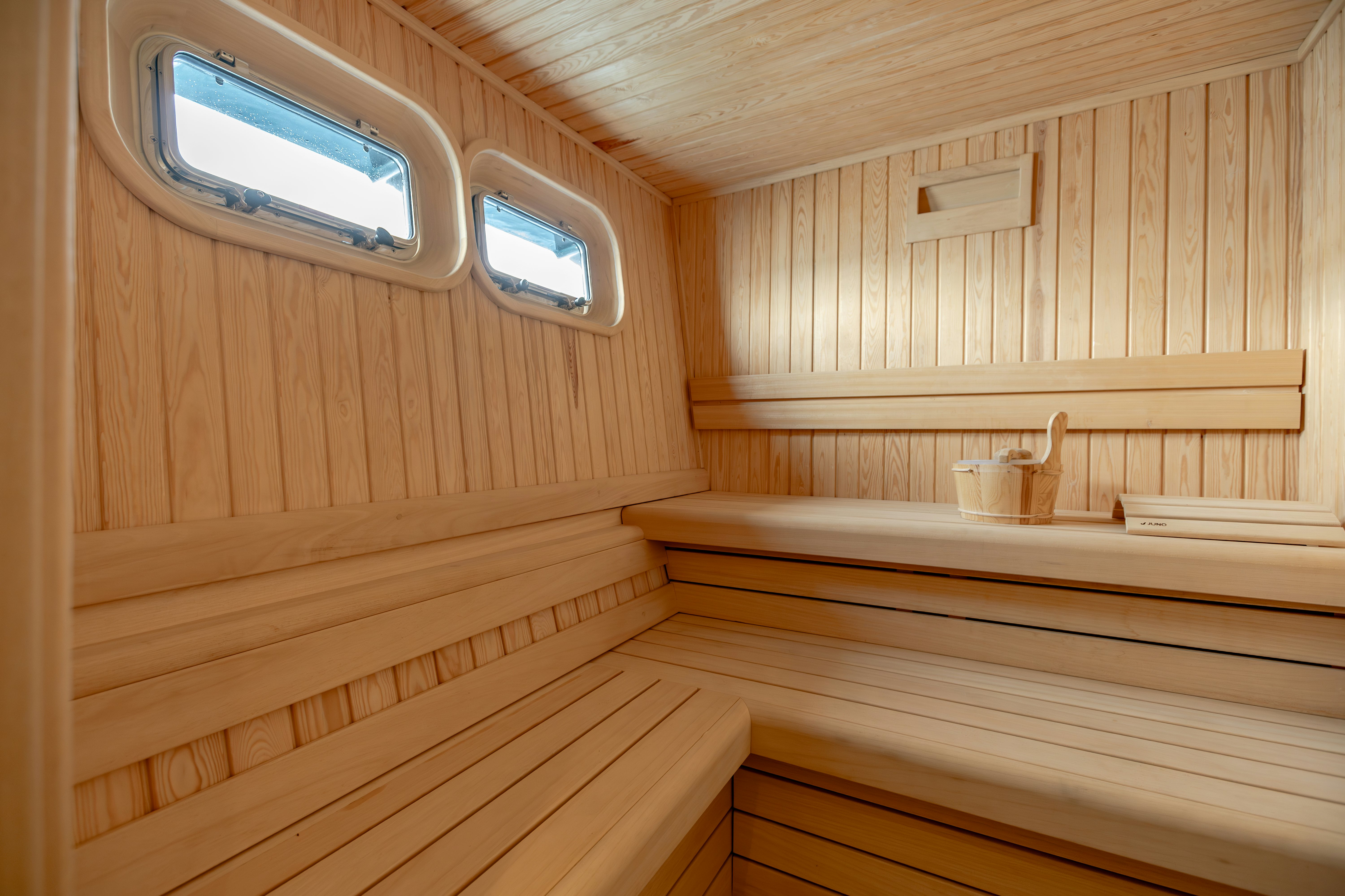 a room with a wood shelf and a window aboard MAORIA Yacht for Sale