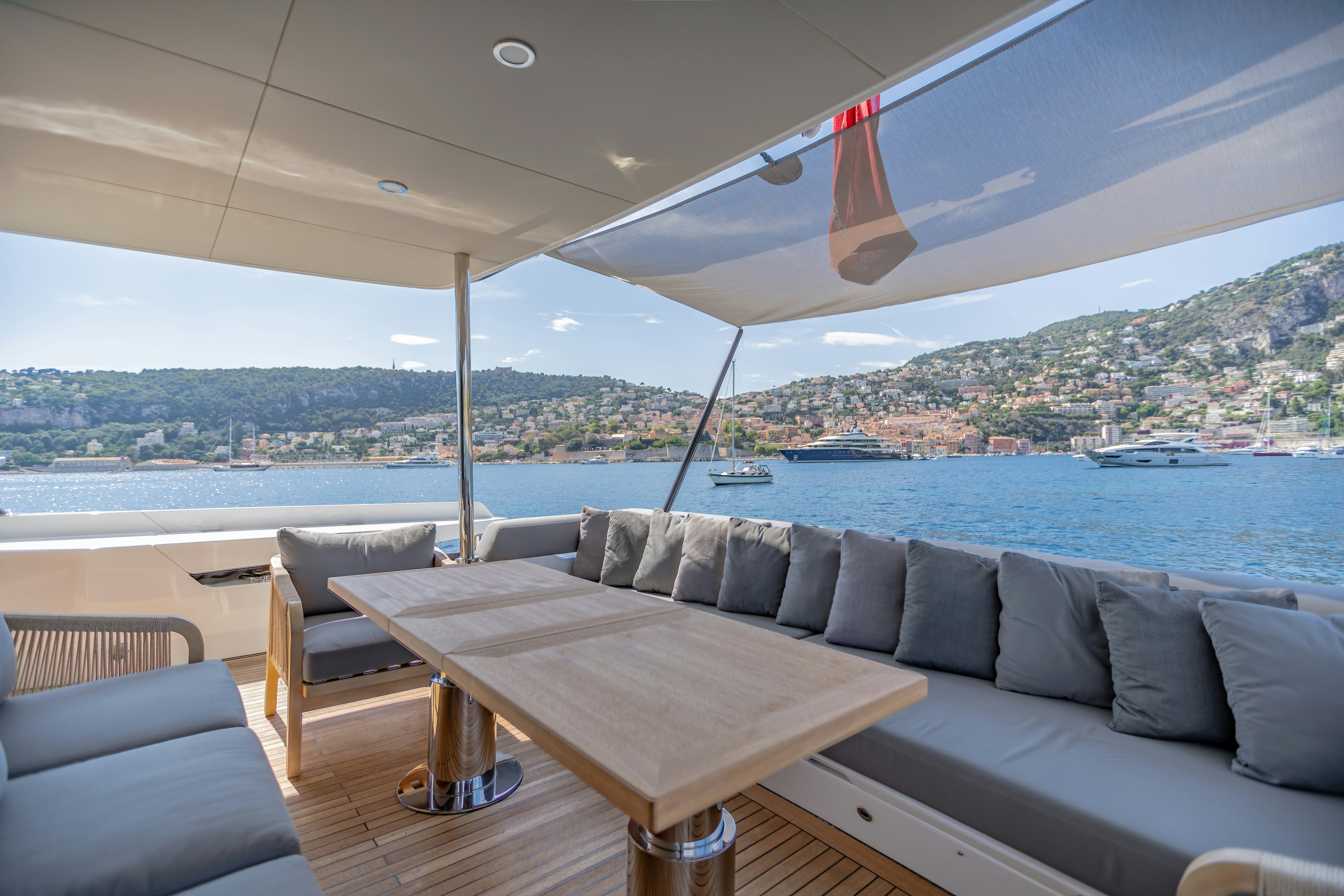 a table and chairs on a boat aboard MAORIA Yacht for Sale
