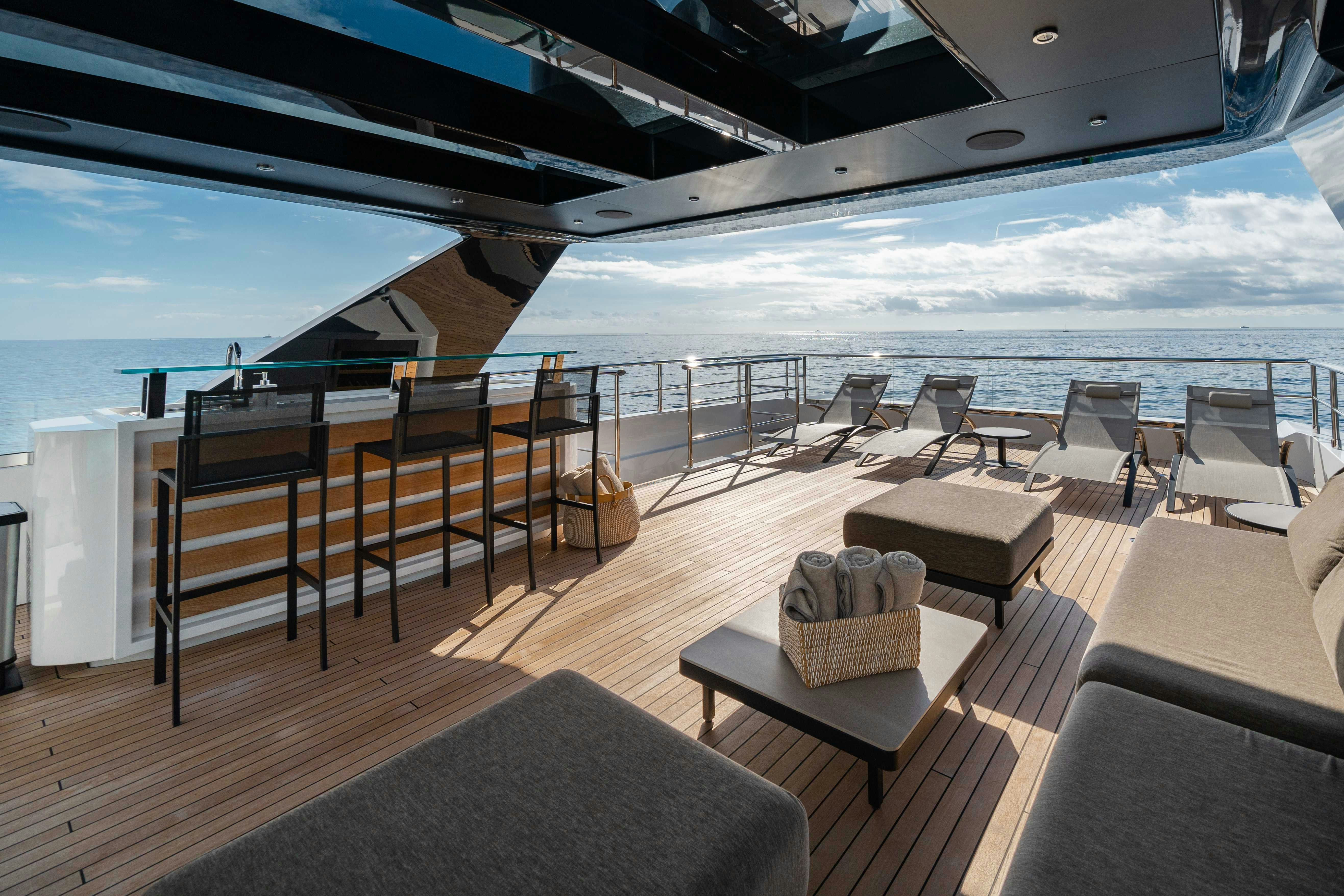 a deck with a view of the ocean and the deck aboard OCEAN KING DUCALE 120 Yacht for Sale