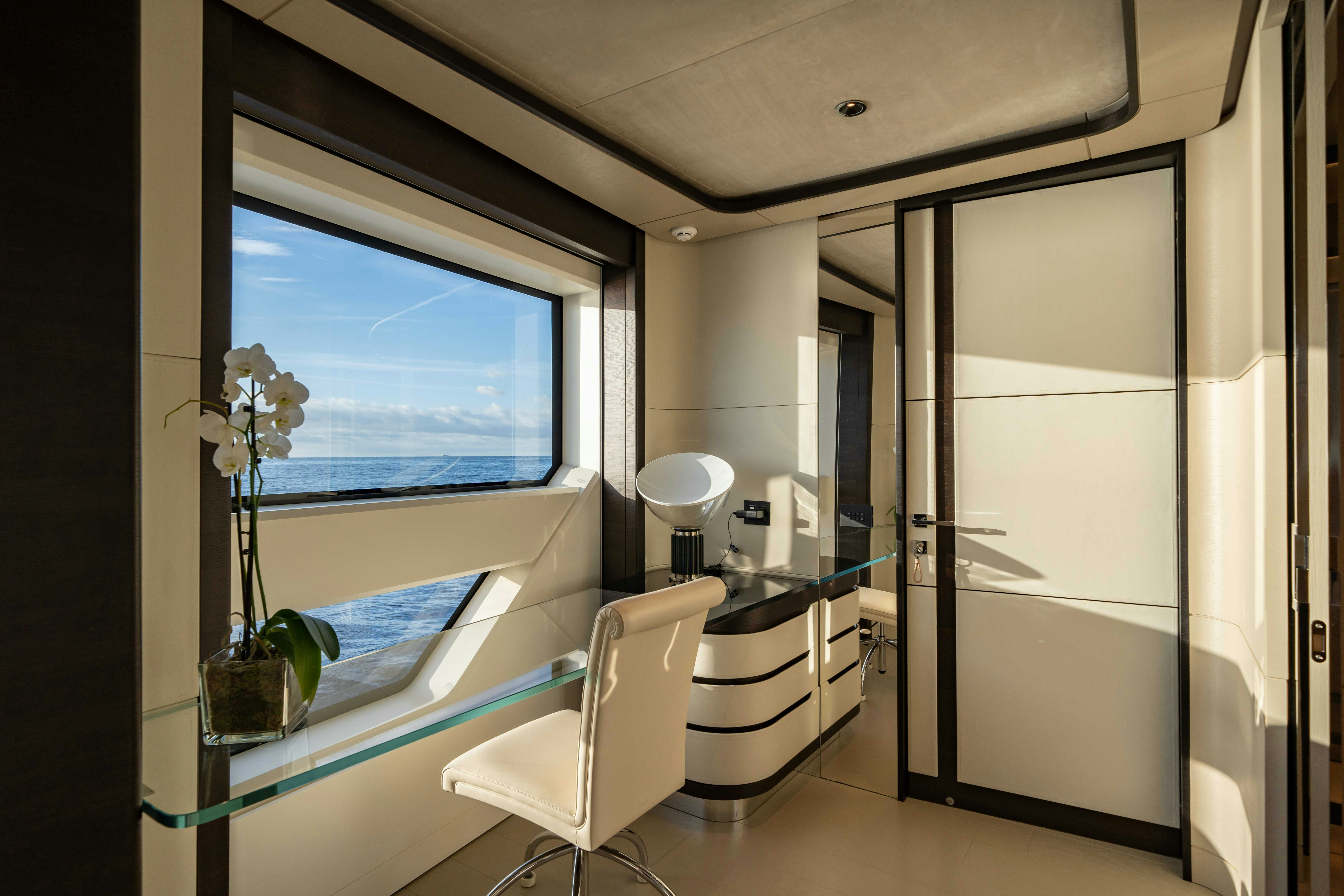 a bathroom with a large window aboard OCEAN KING DUCALE 120 Yacht for Sale