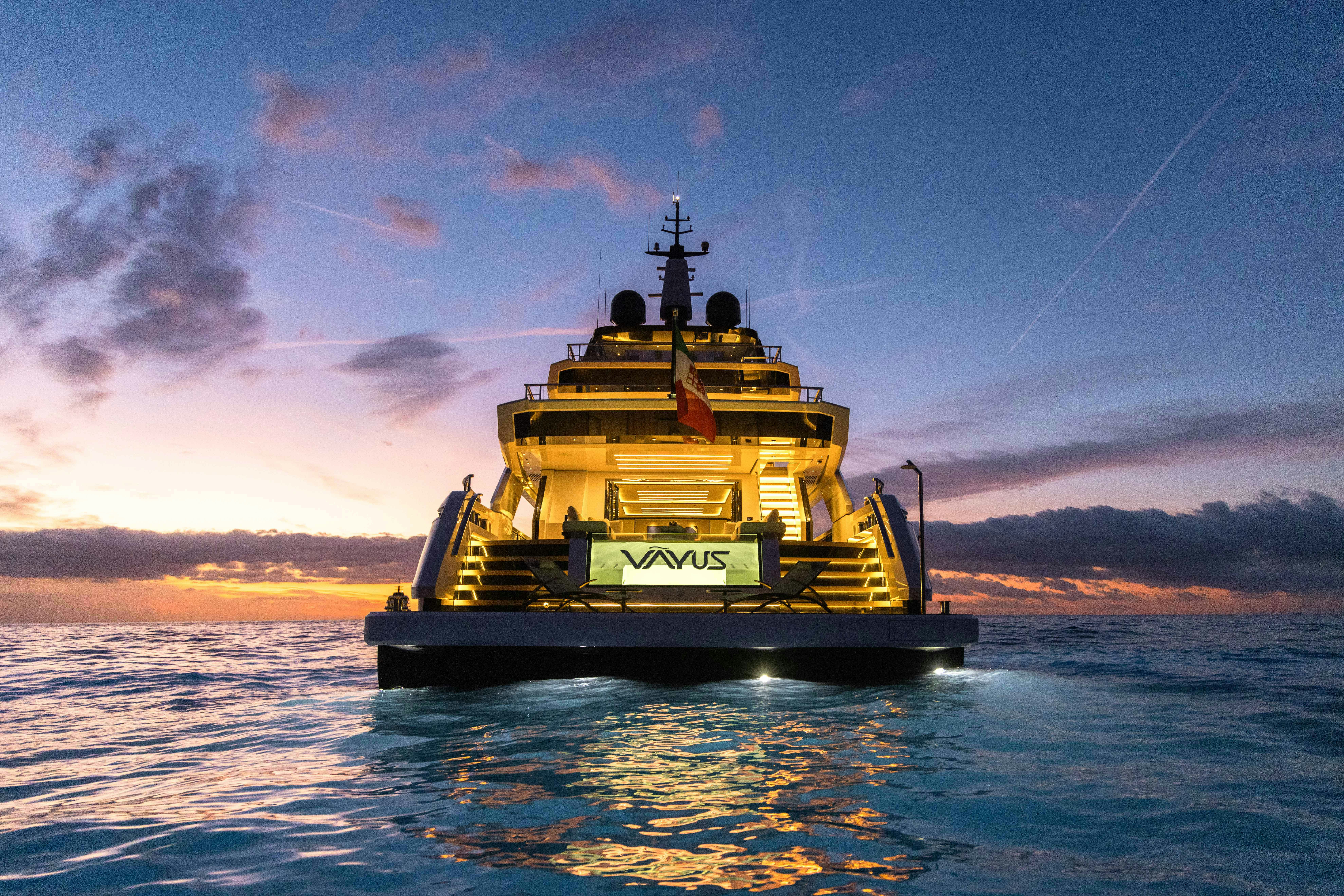 a yellow boat in the water aboard OCEAN KING DUCALE 120 Yacht for Sale