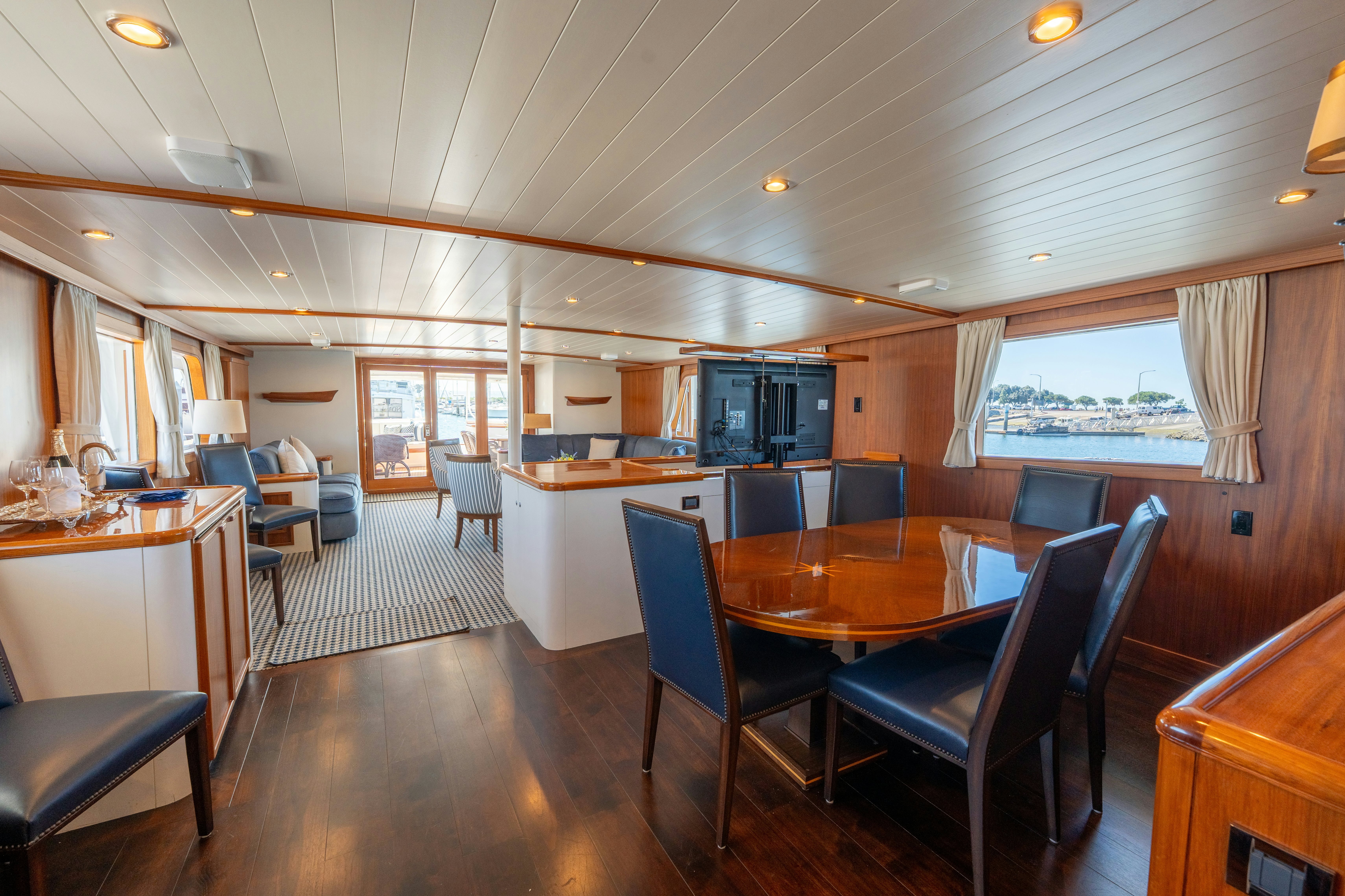 a large kitchen with a dining table aboard NORDIC STAR Yacht for Sale