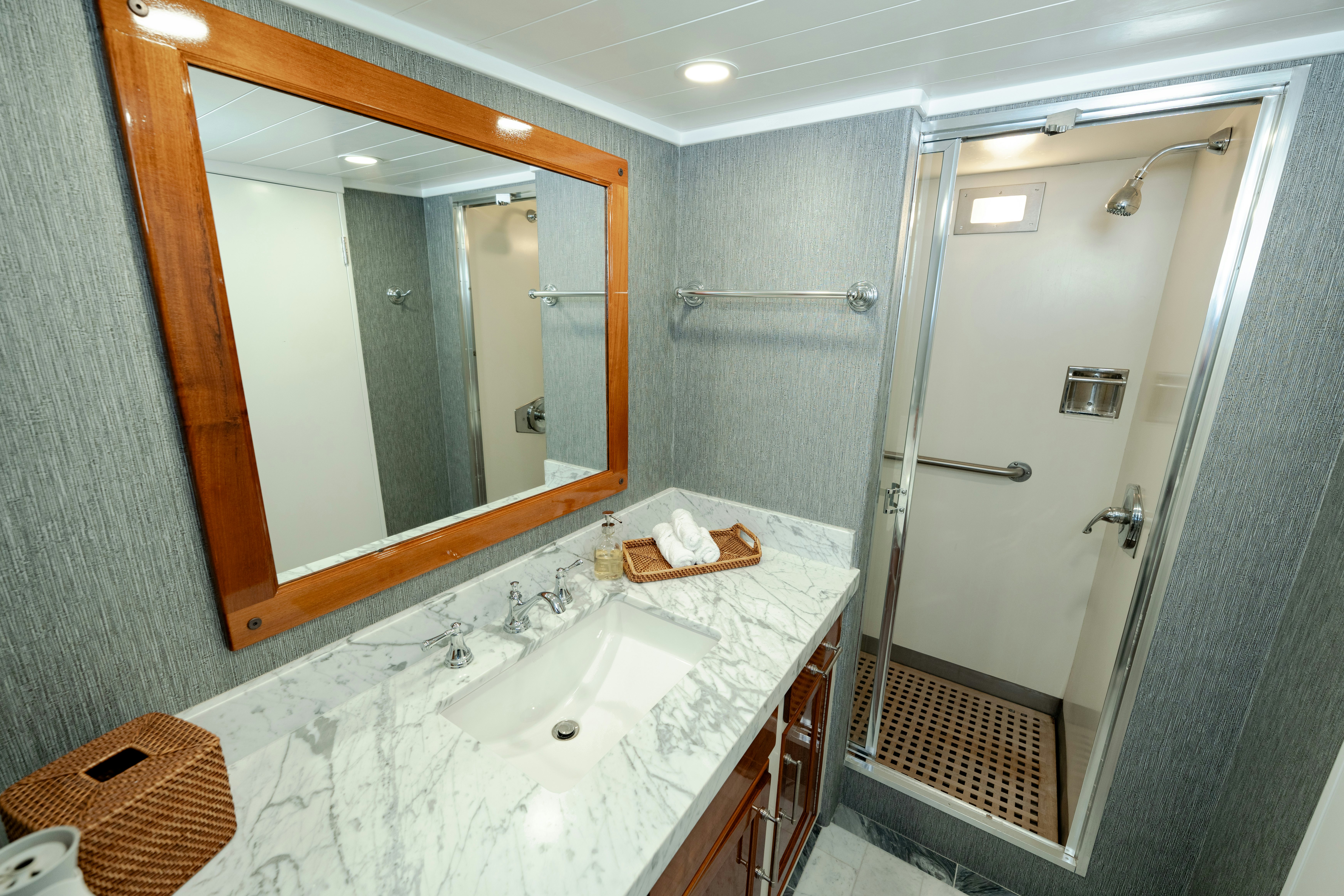 a bathroom with a large mirror aboard NORDIC STAR Yacht for Sale