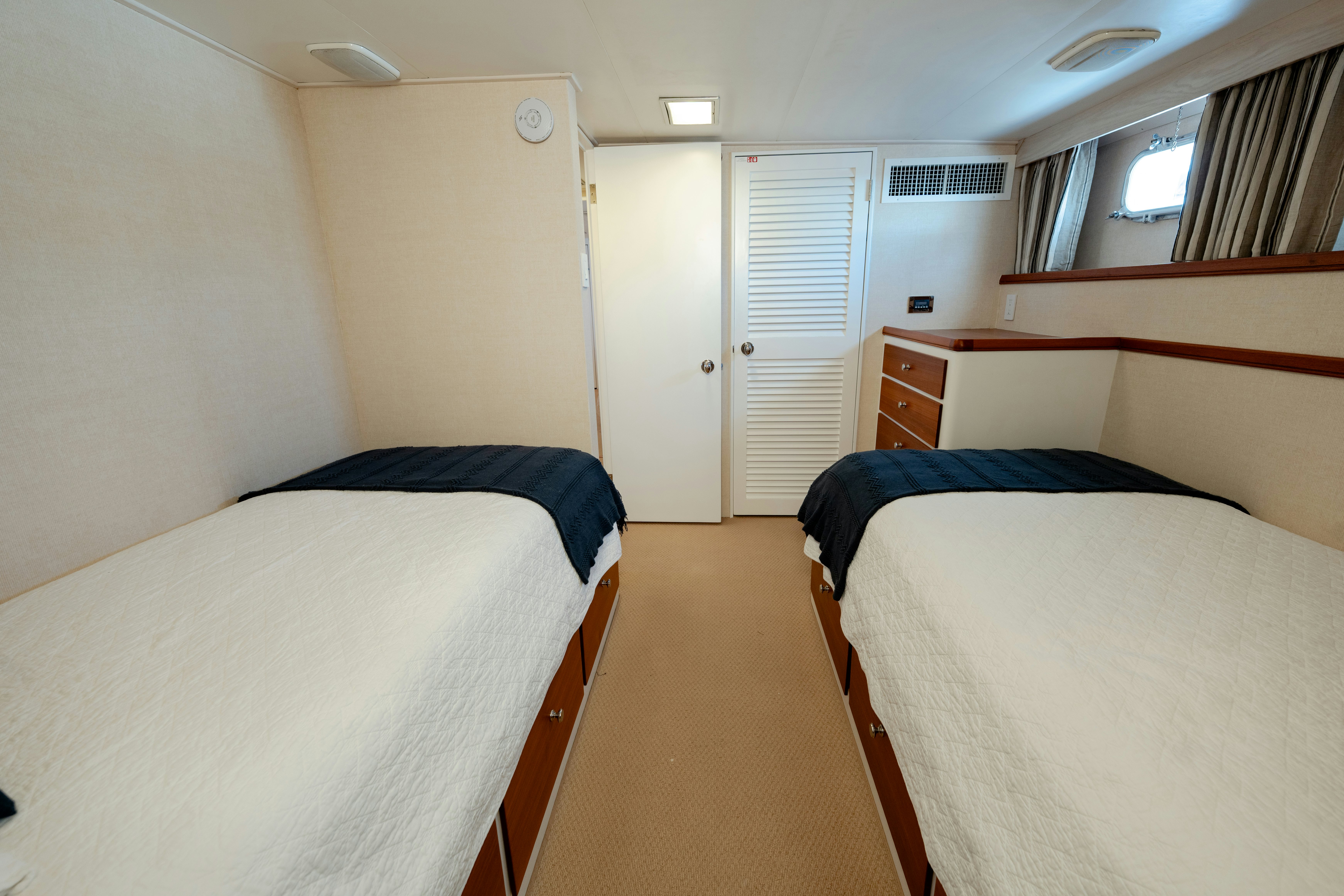 a room with two beds aboard NORDIC STAR Yacht for Sale