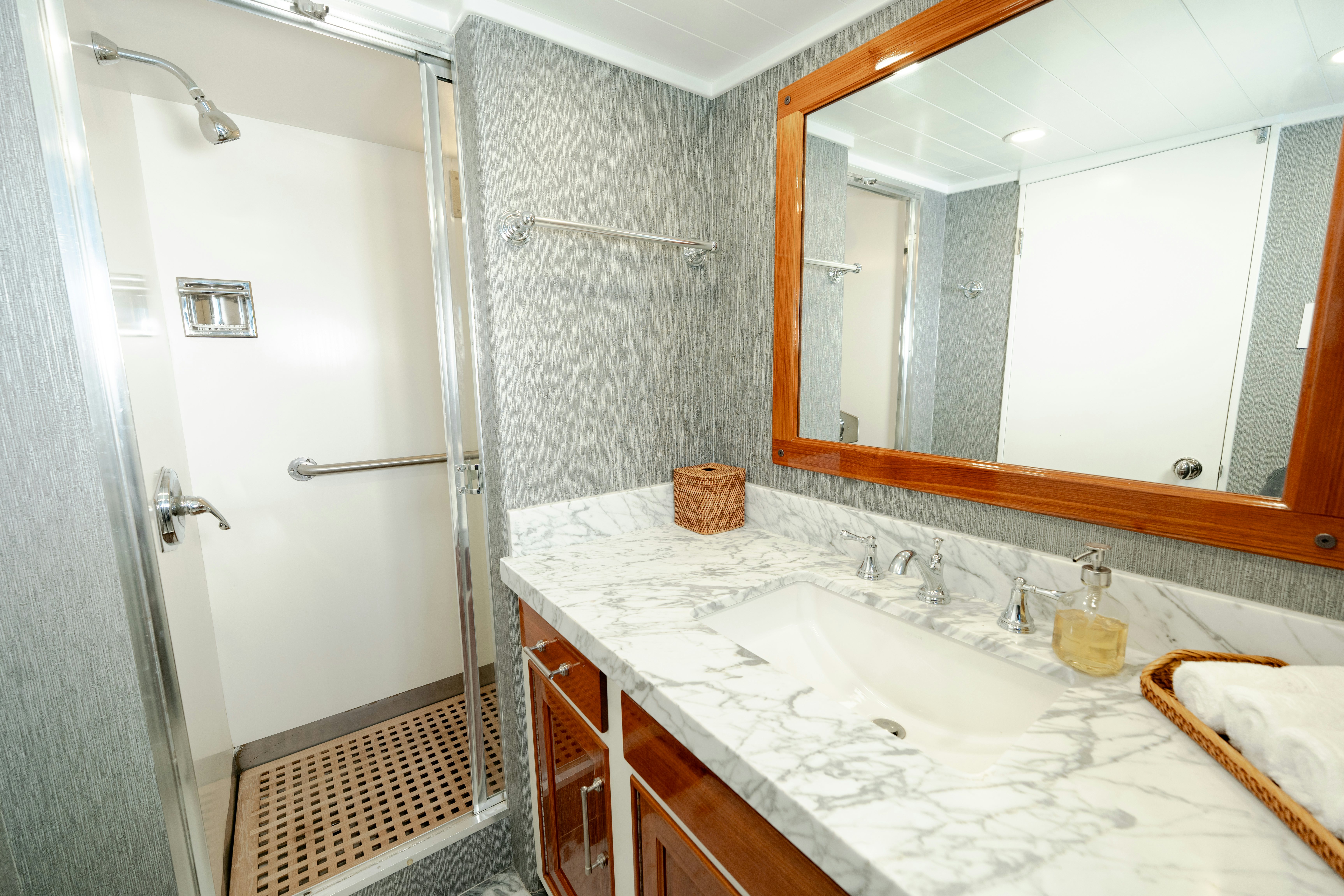 a bathroom with a large mirror aboard NORDIC STAR Yacht for Sale
