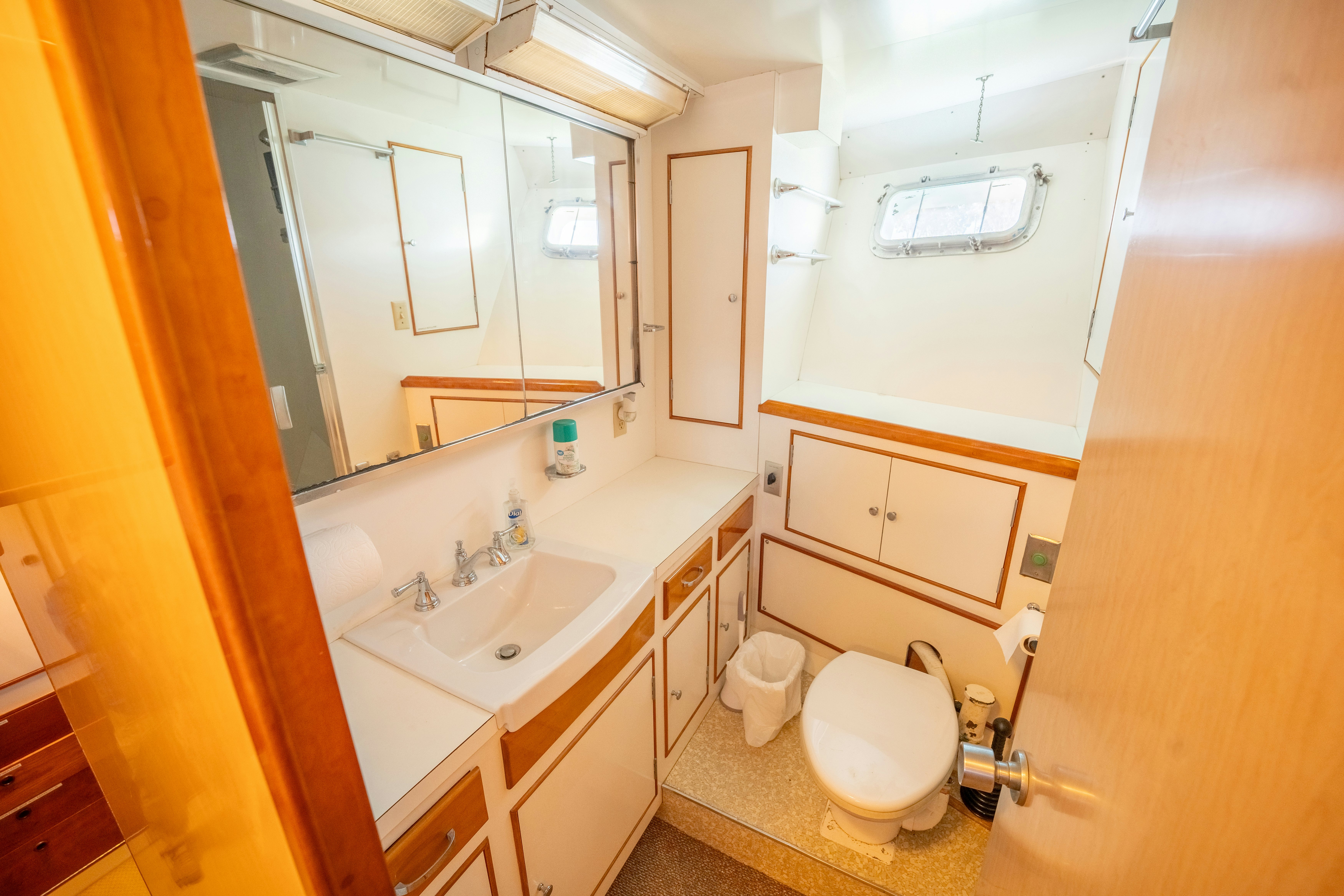 a bathroom with a toilet and sink aboard NORDIC STAR Yacht for Sale