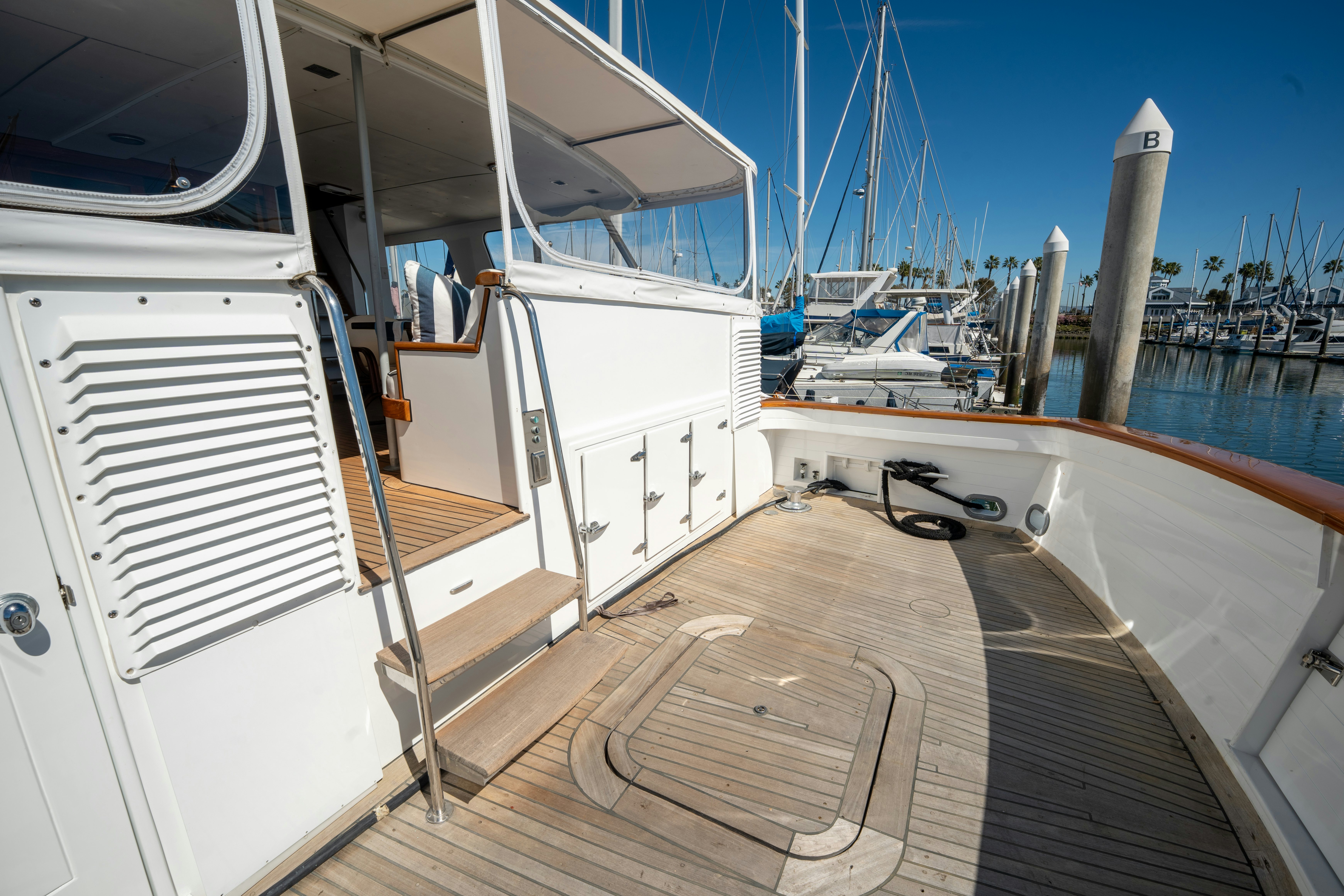 a boat with a wood deck aboard NORDIC STAR Yacht for Sale