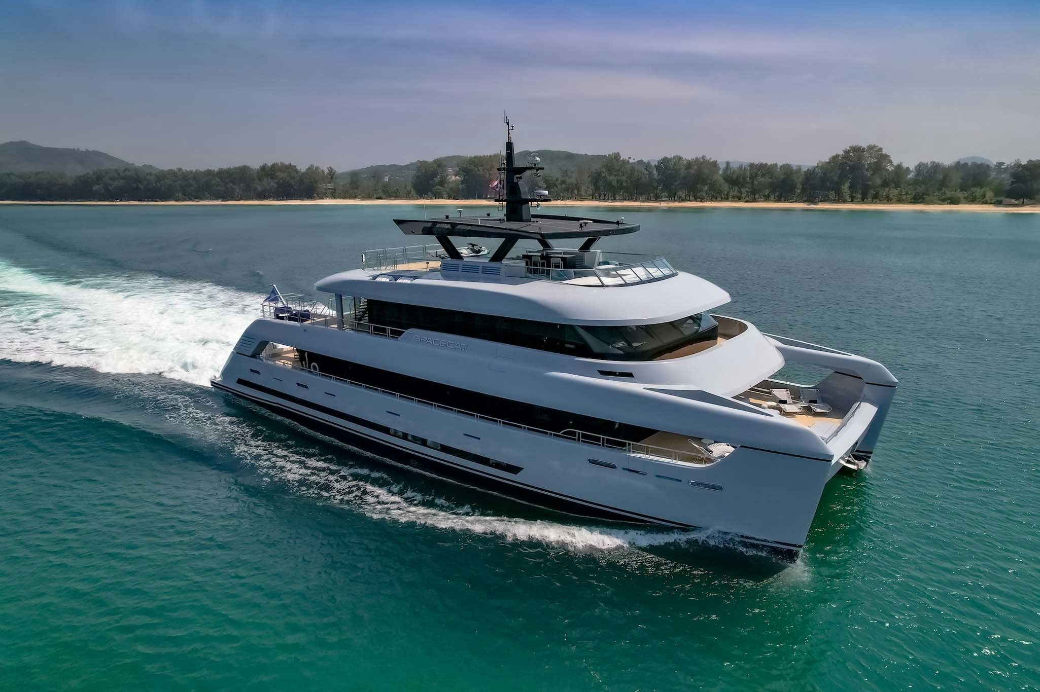 a white yacht on the water aboard SPACECAT Yacht for Charter