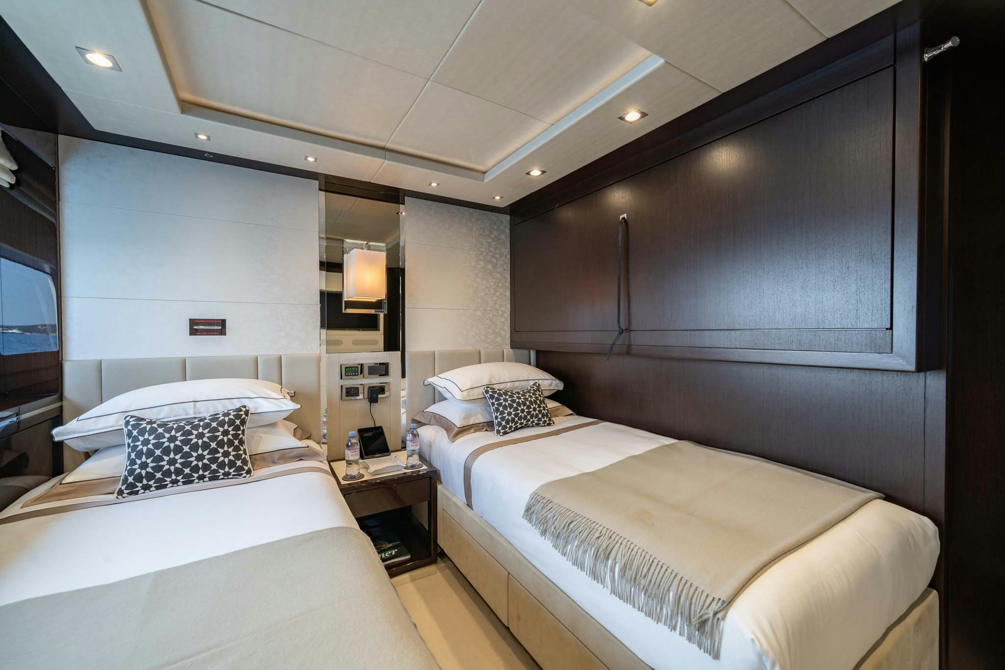 a room with two beds aboard NOROADER Yacht for Charter