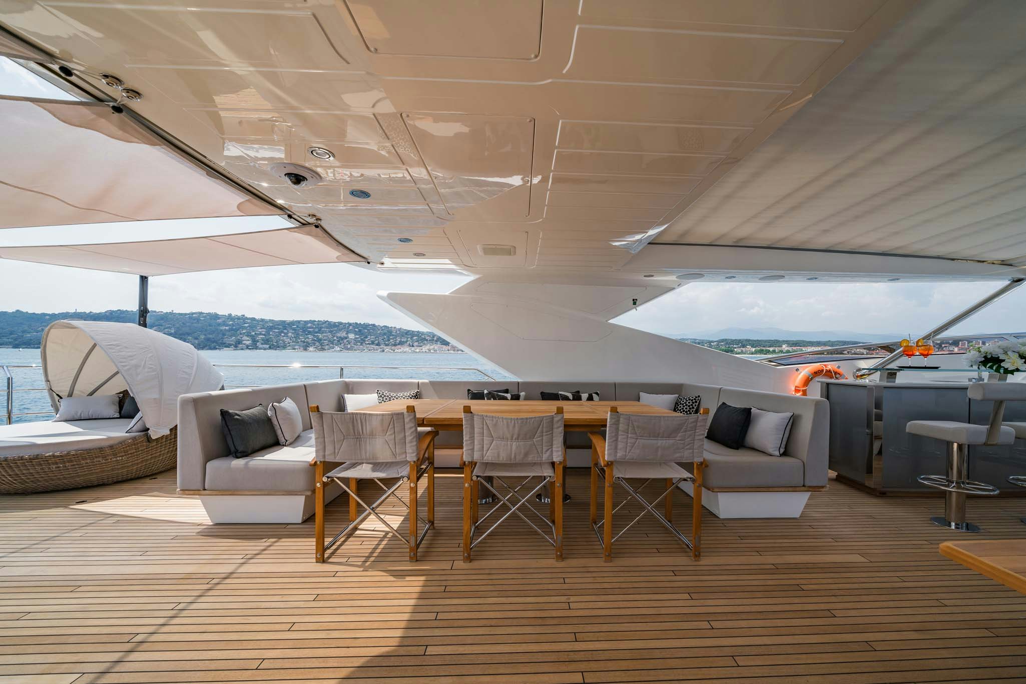 a room with a table and chairs aboard NOROADER Yacht for Charter
