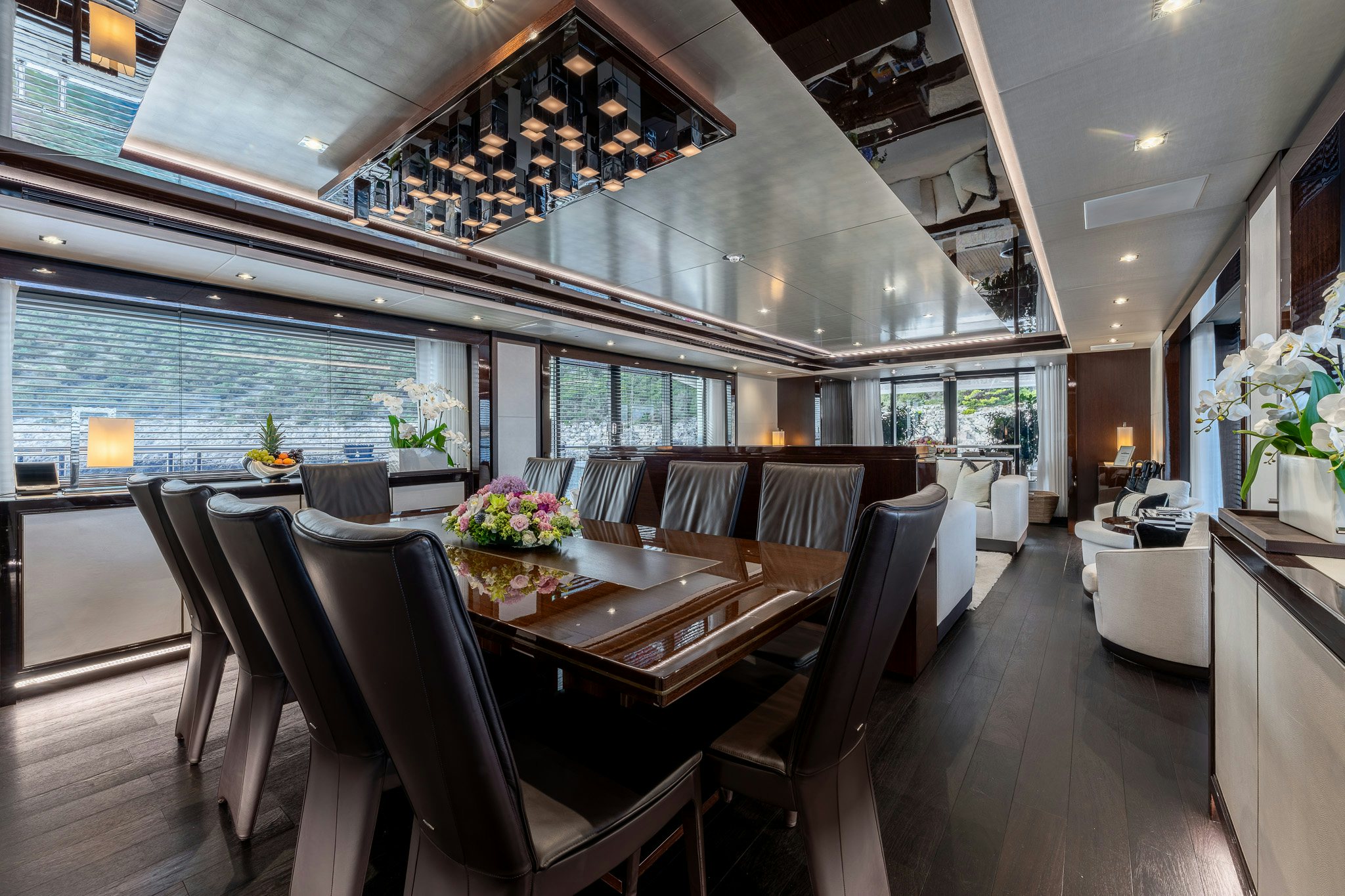 a dining room with a large table aboard NOROADER Yacht for Sale