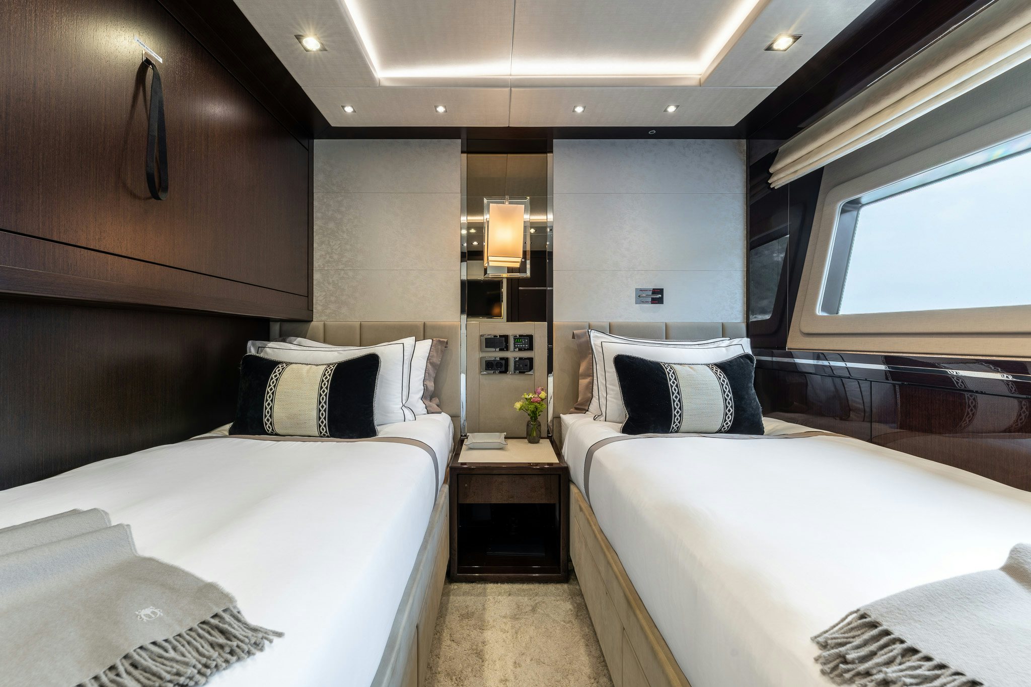 a room with two beds aboard NOROADER Yacht for Sale