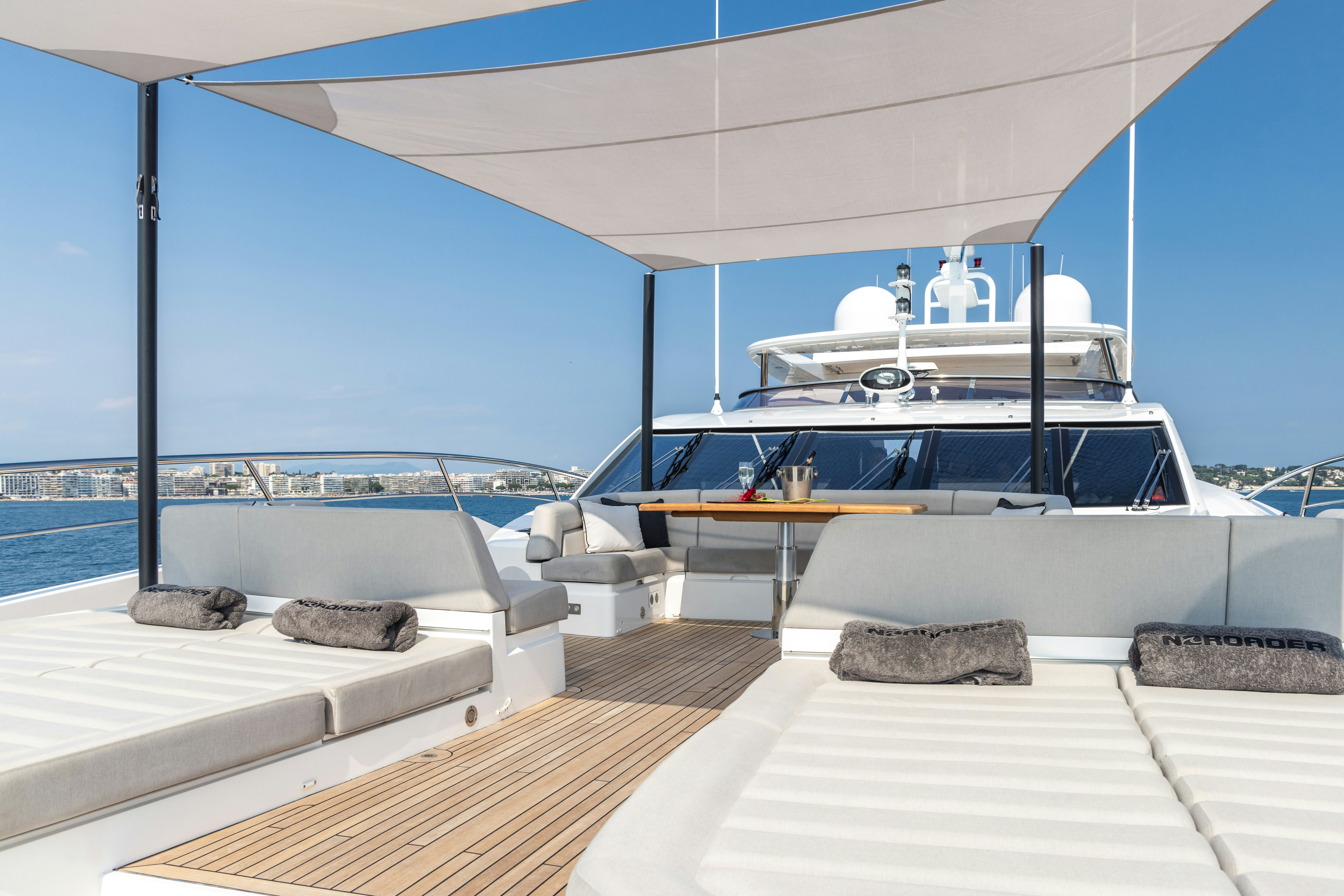 a boat with a view of the ocean aboard NOROADER Yacht for Charter
