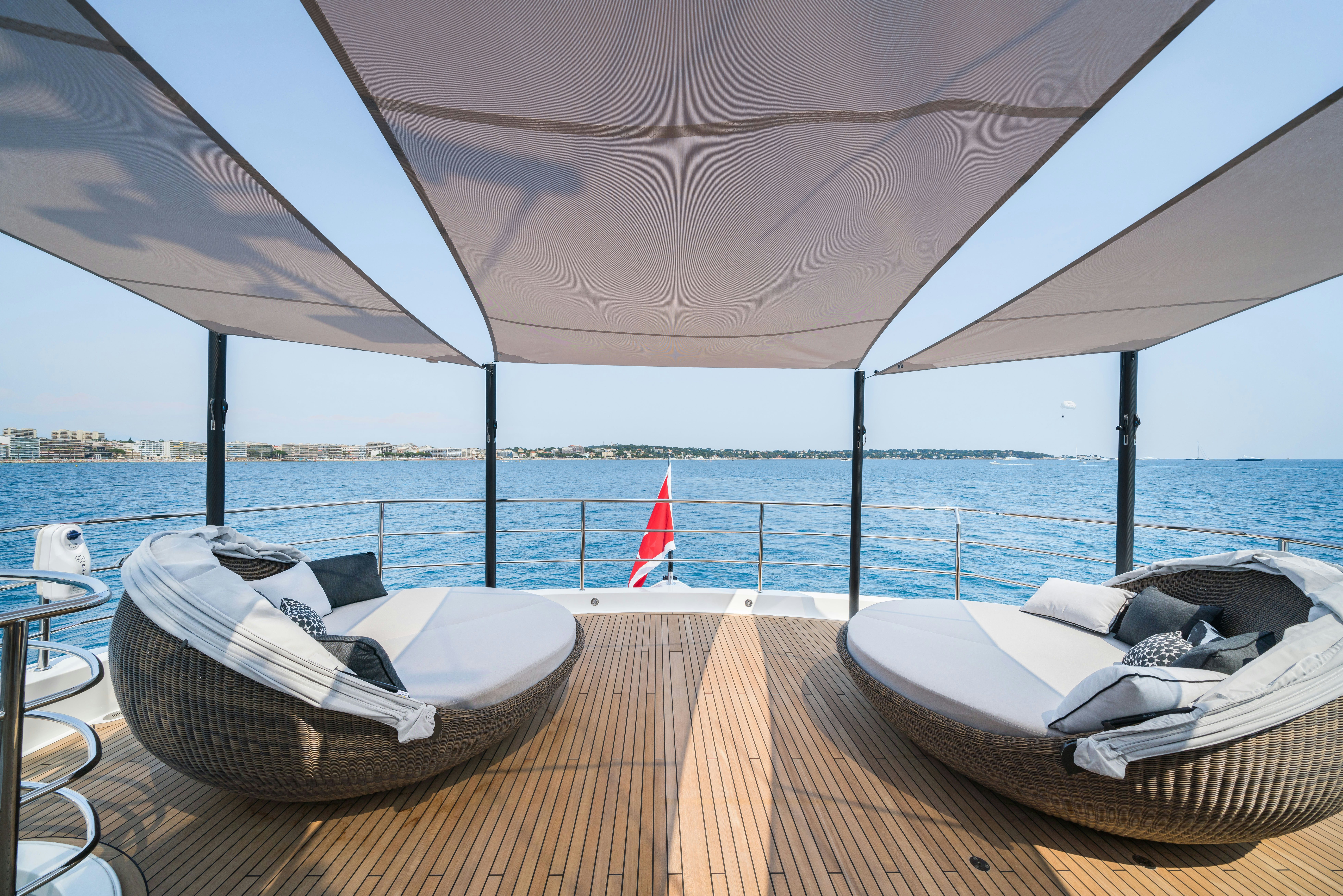 a bed on a deck aboard NOROADER Yacht for Charter