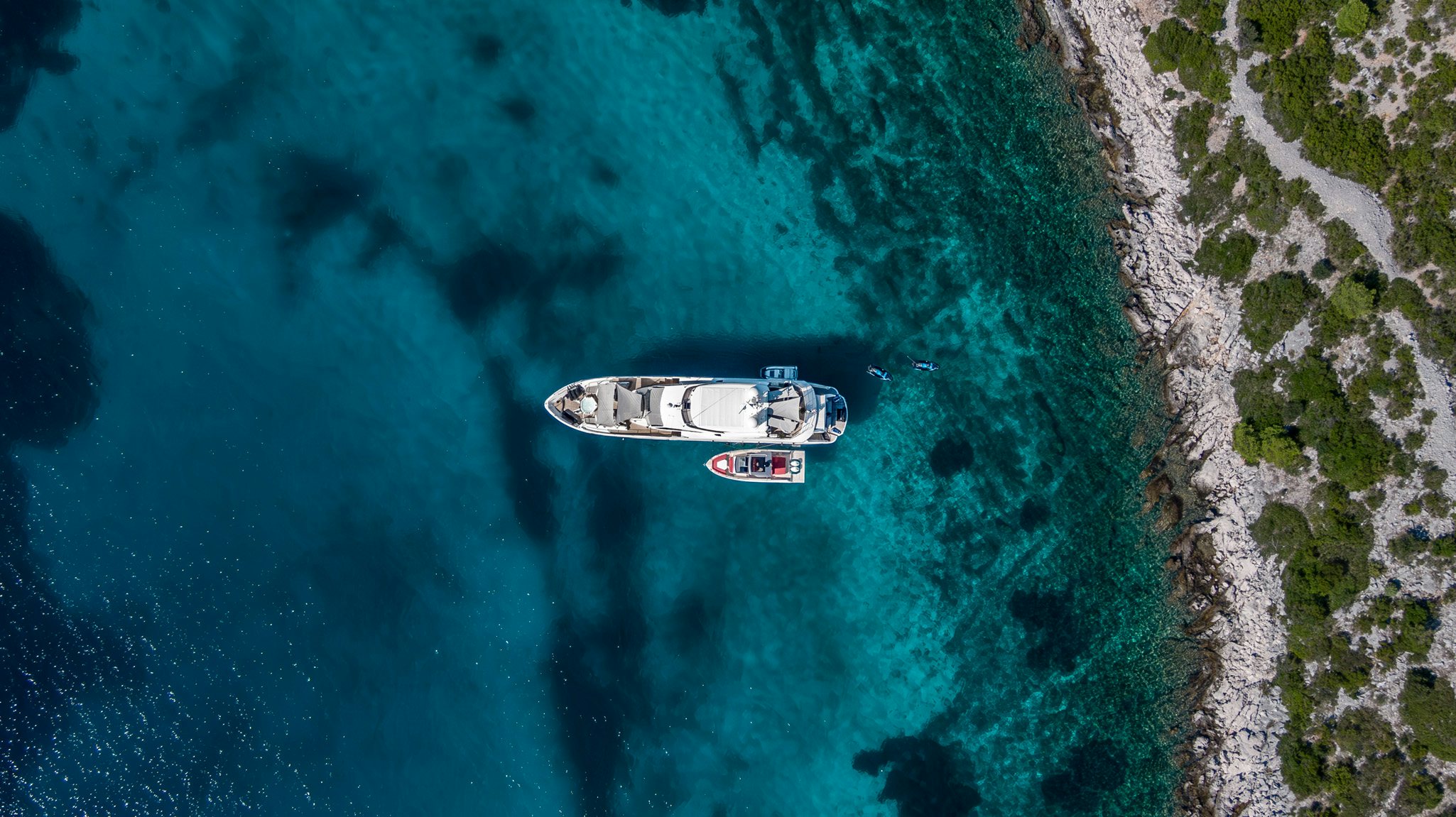 a car driving on a road aboard NOROADER Yacht for Charter