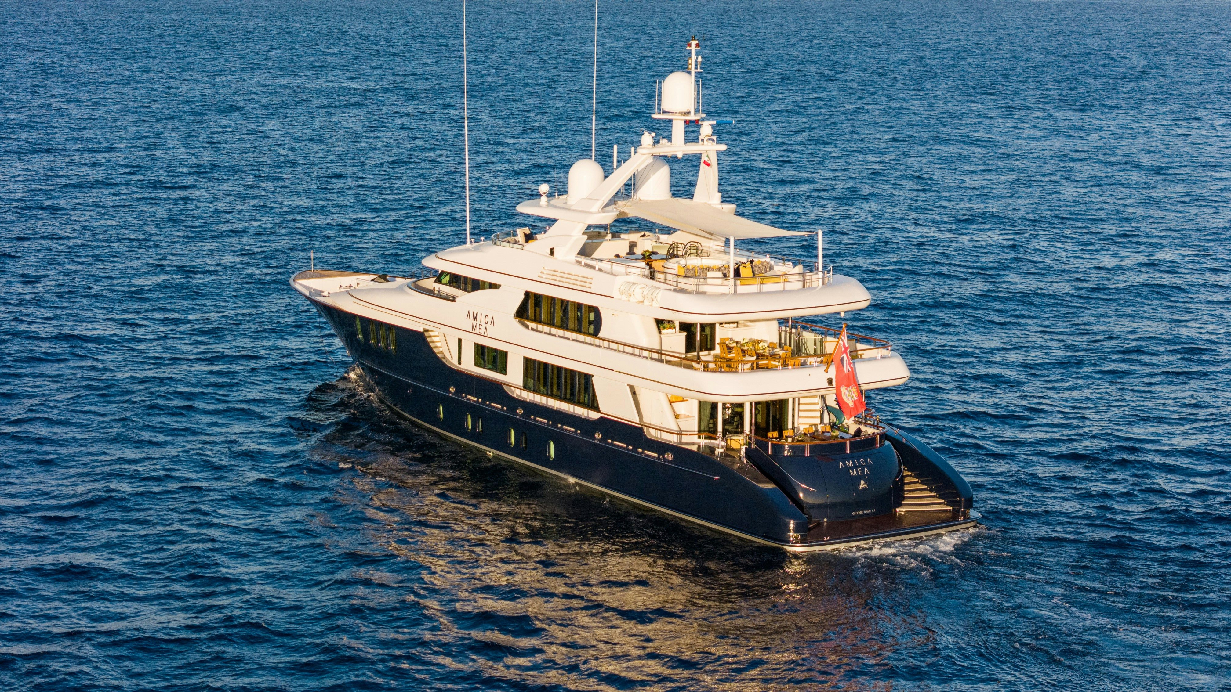 a large boat in the water aboard AMICA MEA Yacht for Charter