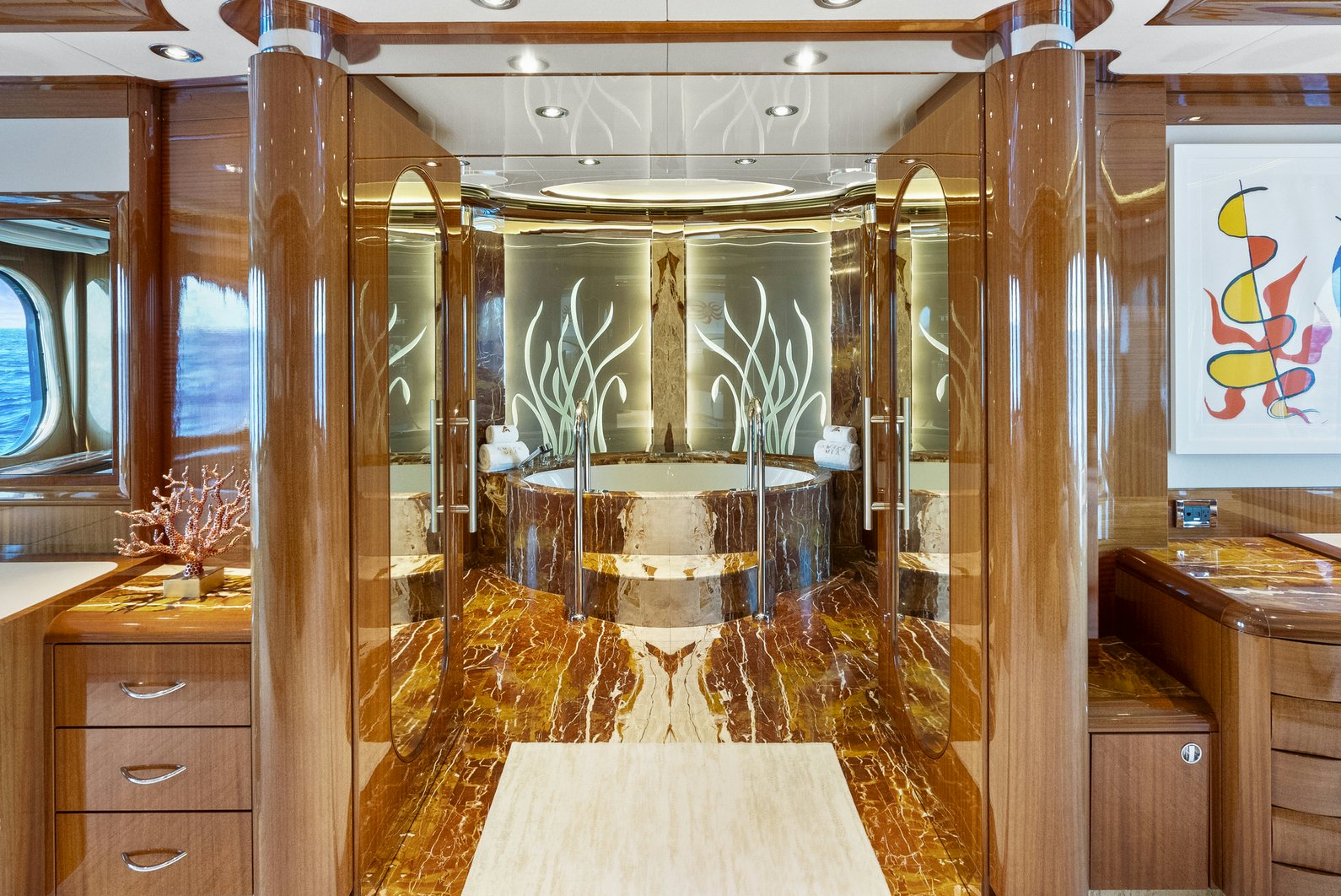 a room with a large glass door aboard AMICA MEA Yacht for Charter